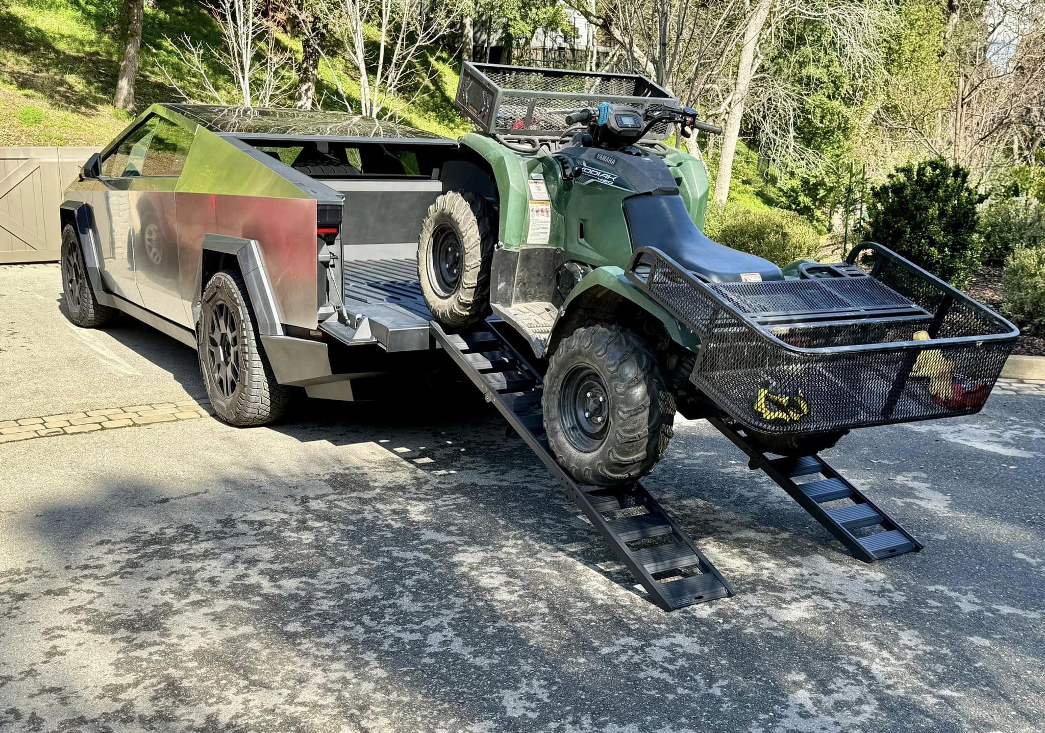 Cybertruck Tailgate Ramp used to load Yamaha ATV onto bed 3.jpg