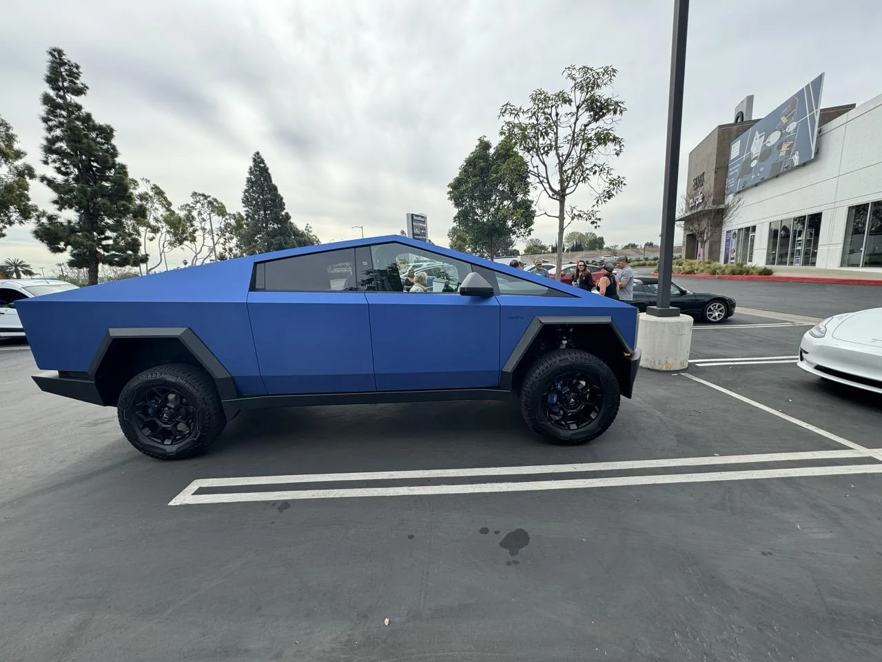 Tesla Cybertruck My Cybertruck in matte blue wrap + TSportline 20" CT7 Wheels + Painted Brake Calipers img_0529-large-jpeg