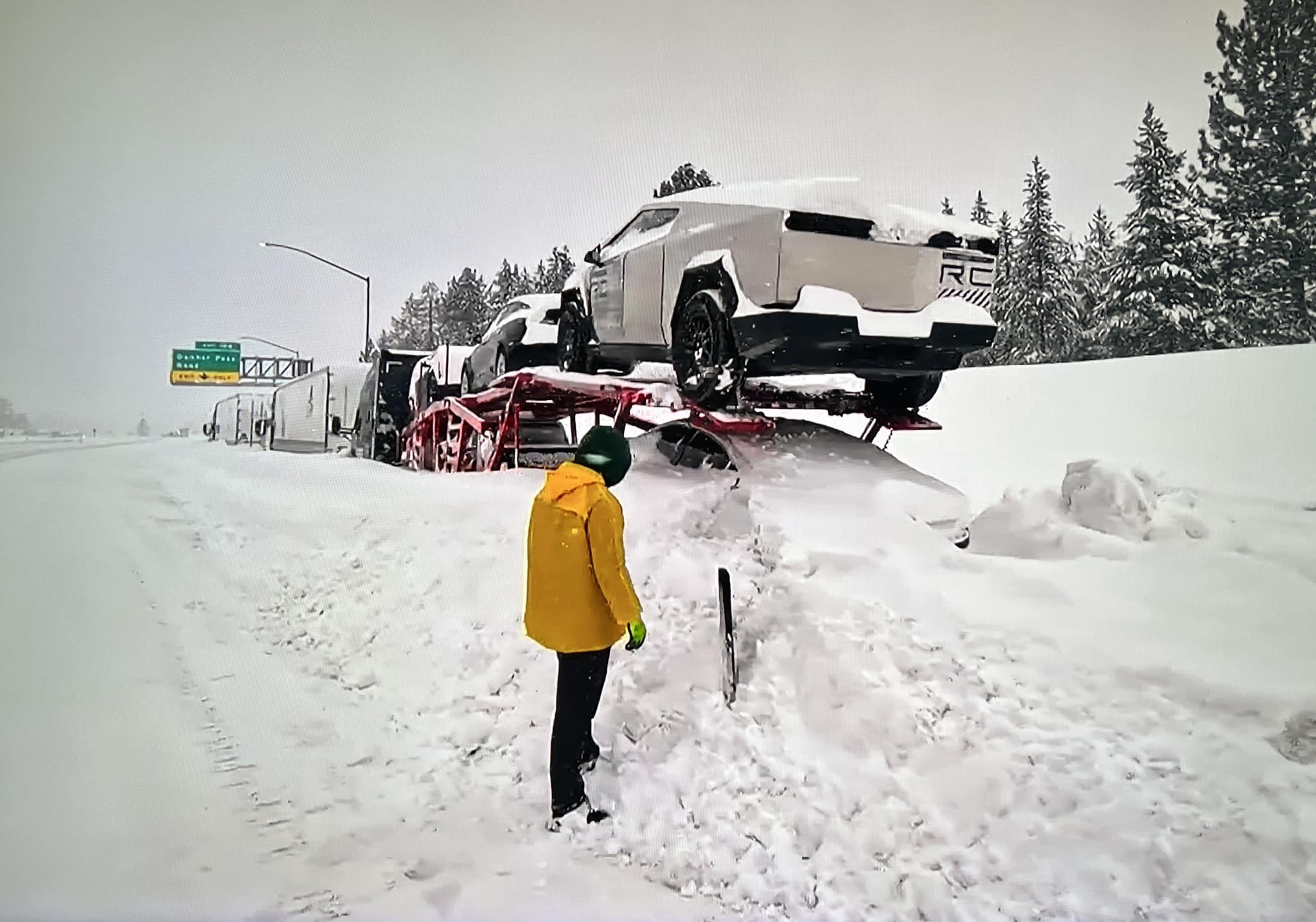 Tesla Cybertruck 2 Cybertrucks stuck on vehicle hauler in blizzard at Donner Pass 431339724_10226633443757339_1052088219321510579_n