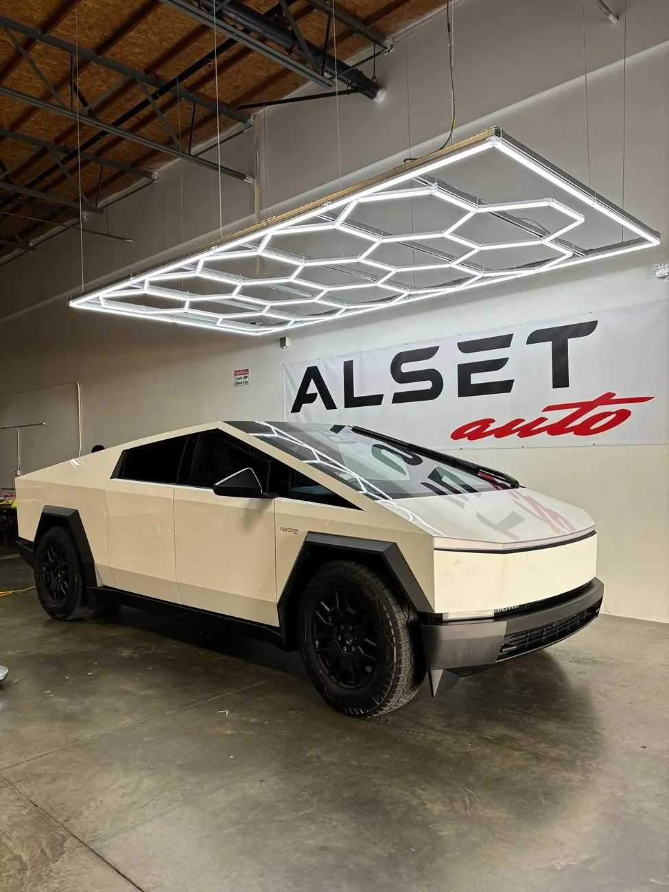 Tesla Cybertruck This Cybertruck in Gloss White PPF would fit in at a Tuxedo Event (Photos) IMG_0848