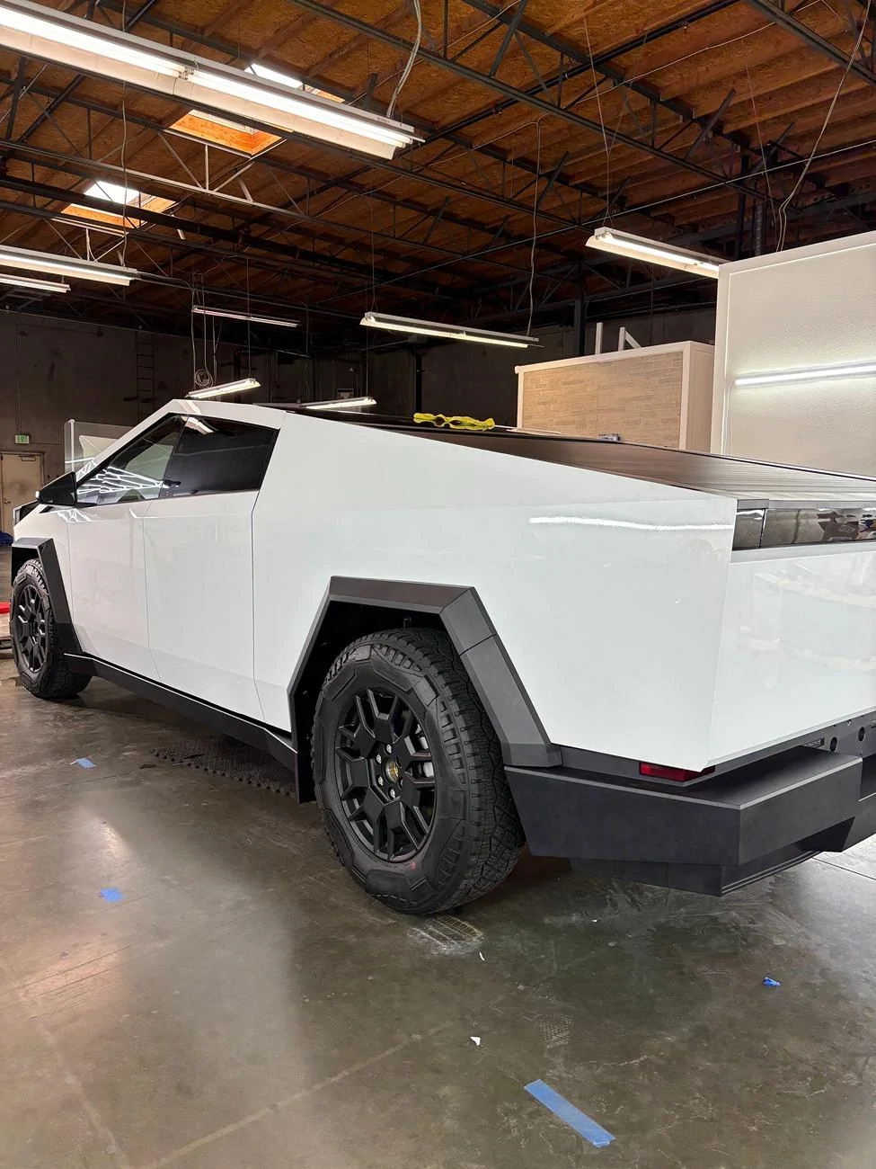 Tesla Cybertruck This Cybertruck in Gloss White PPF would fit in at a Tuxedo Event (Photos) IMG_0833