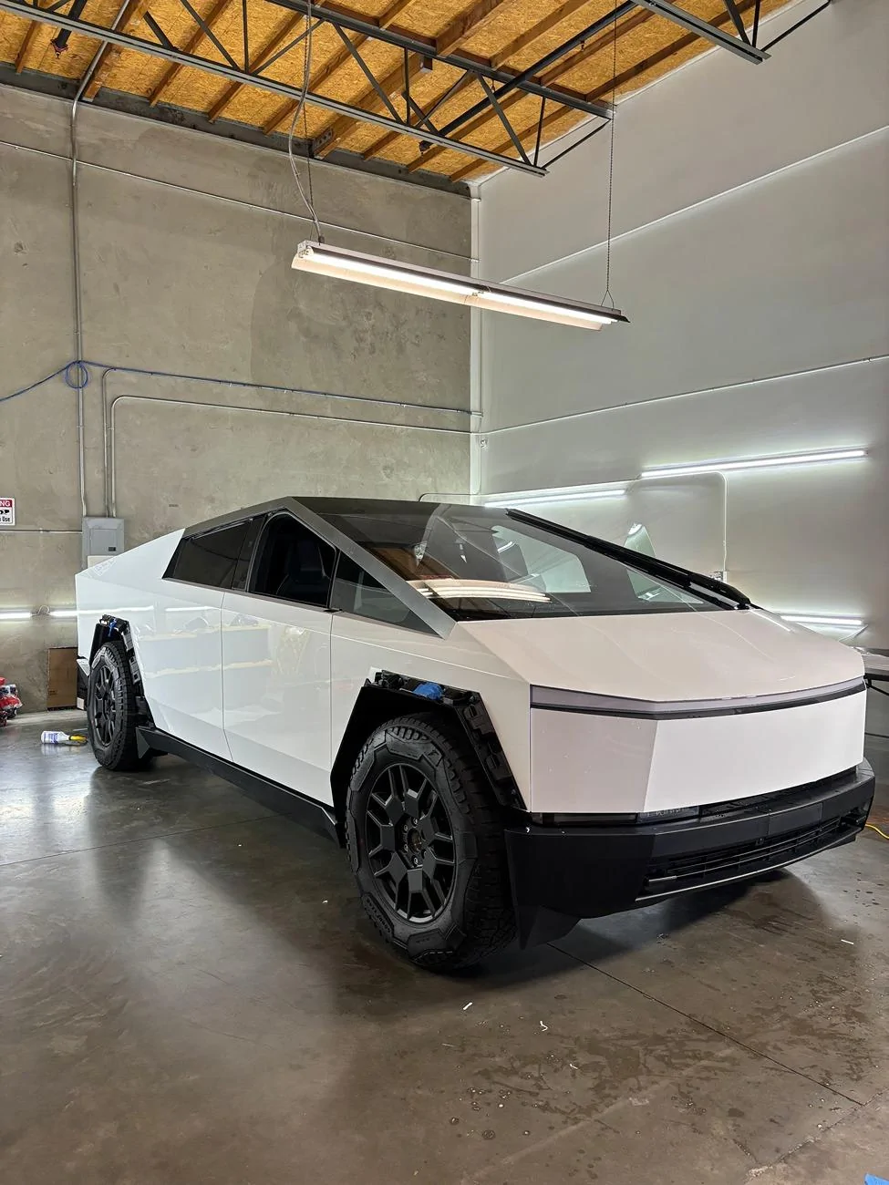 Tesla Cybertruck This Cybertruck in Gloss White PPF would fit in at a Tuxedo Event (Photos) IMG_0829