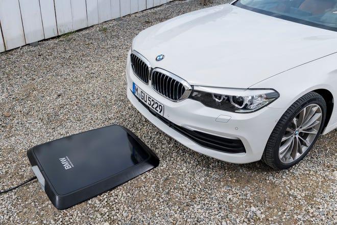 Tesla Cybertruck Wireless Charging - Any Possibility for the Cyber Truck? dfd6447e8cc3-BMW_wireless_EV_charging_-_credit_BMW
