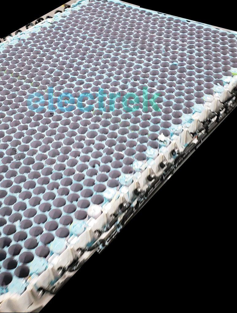 Tesla Cybertruck First look at Tesla’s new structural battery pack that will power future vehicles Tesla-honeycomb-structural-battery-pack-1