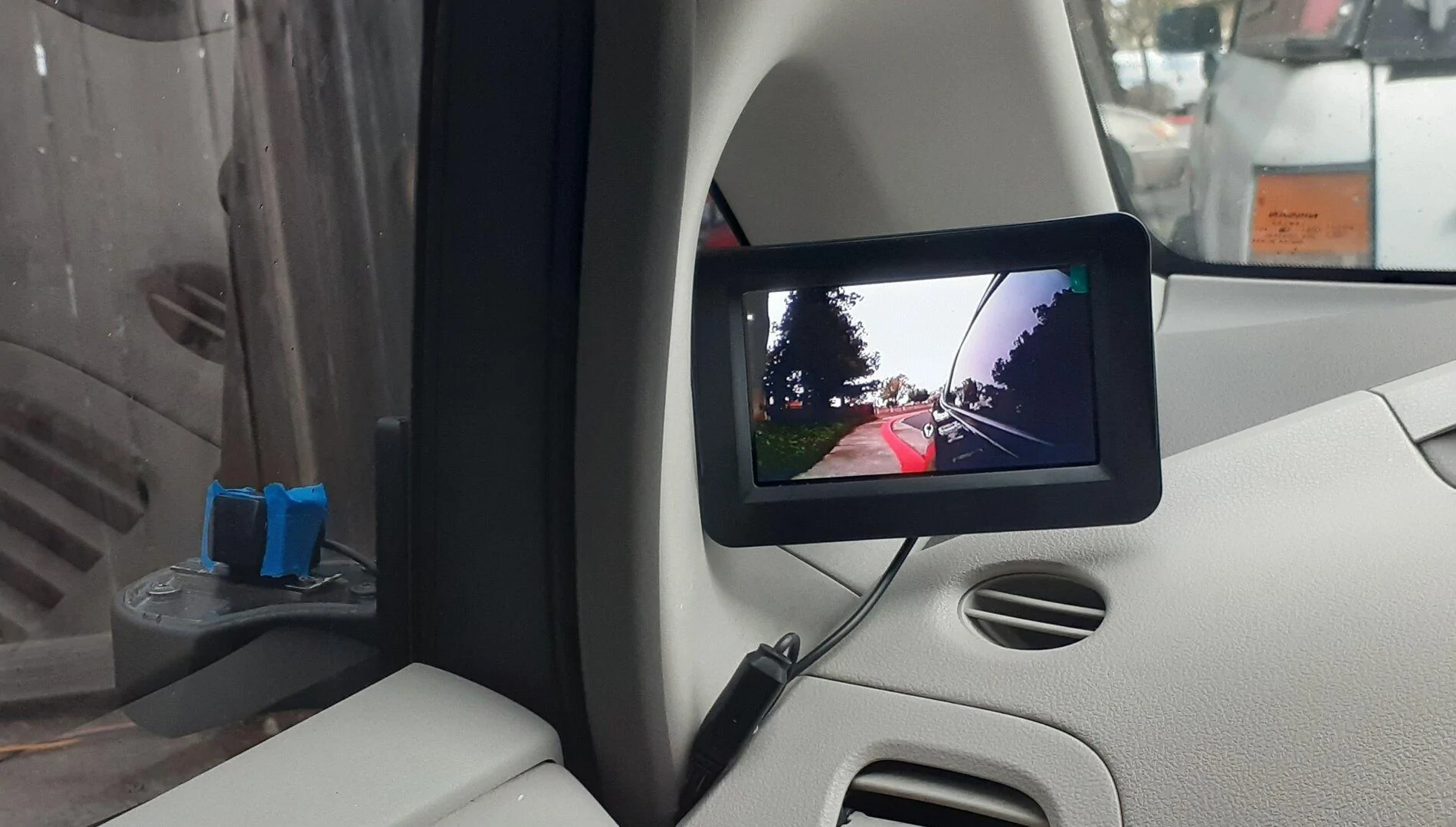 Tesla Cybertruck camera side mirror on leaf 20210126_183614