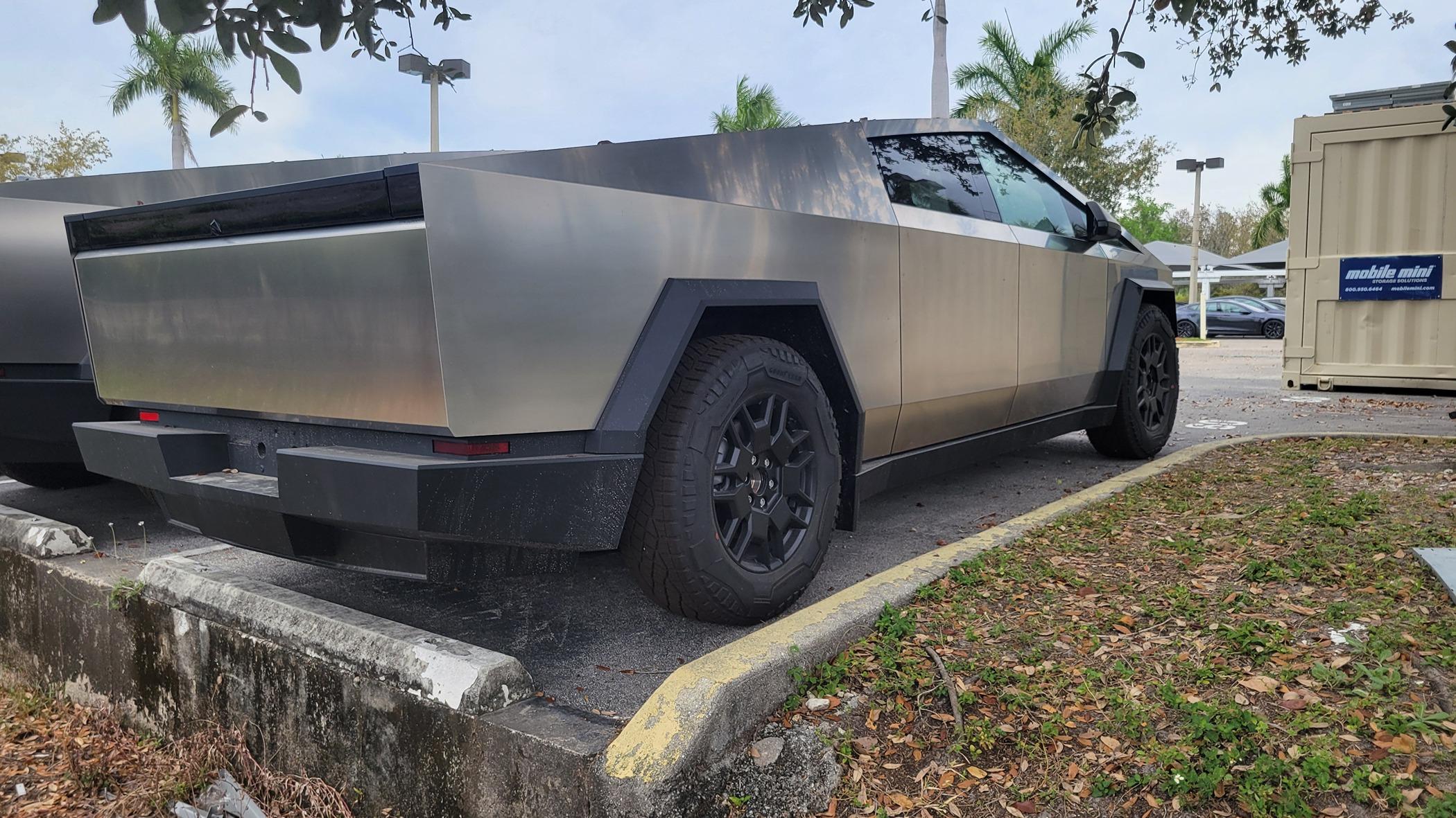 Tesla Cybertruck 3 Cybertrucks compared to my Ridgeline @ Fort Myers, FL - Service Center 20240302_142115