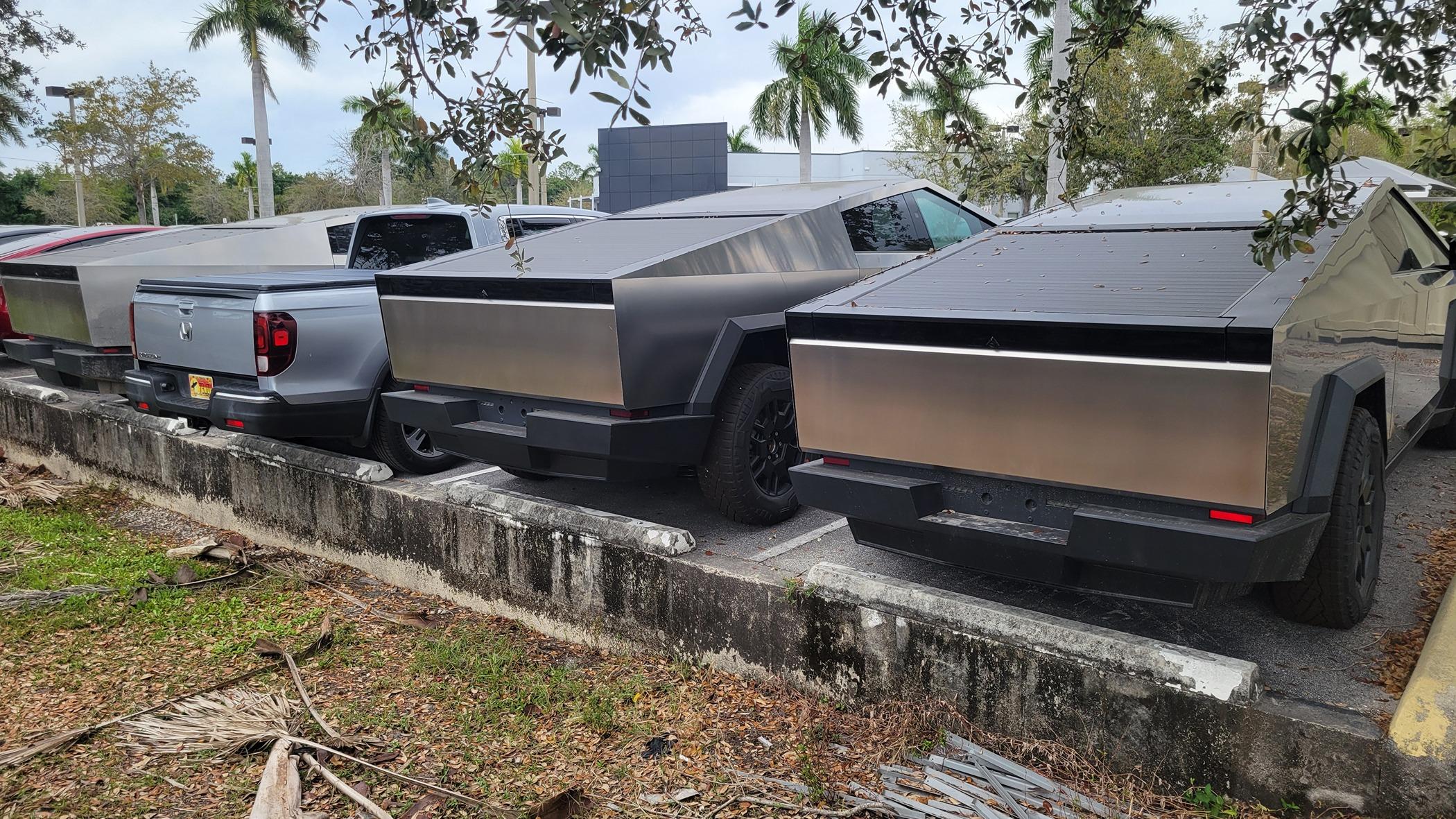 Tesla Cybertruck 3 Cybertrucks compared to my Ridgeline @ Fort Myers, FL - Service Center 20240302_142104