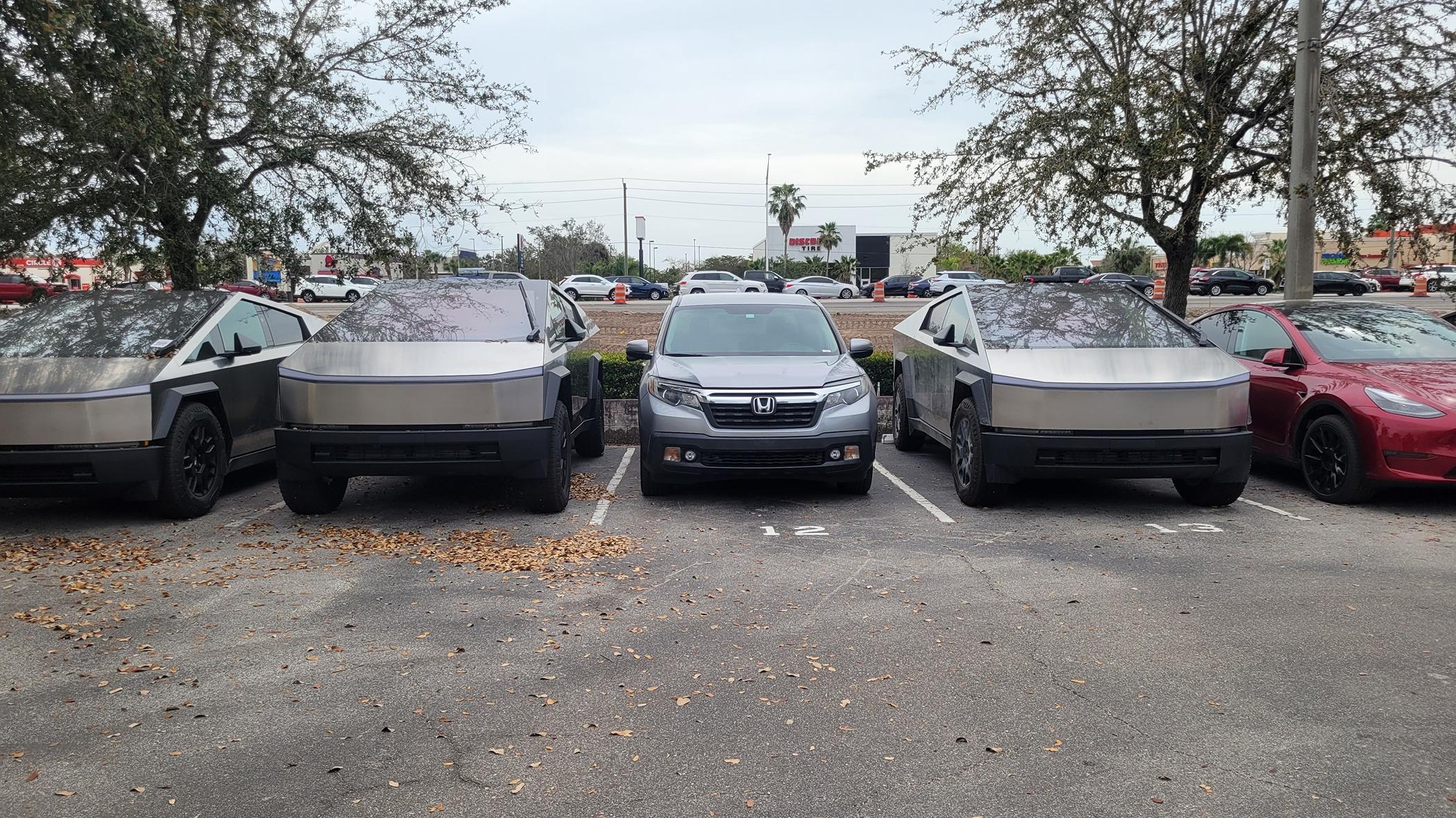 Tesla Cybertruck 3 Cybertrucks compared to my Ridgeline @ Fort Myers, FL - Service Center 20240302_142510