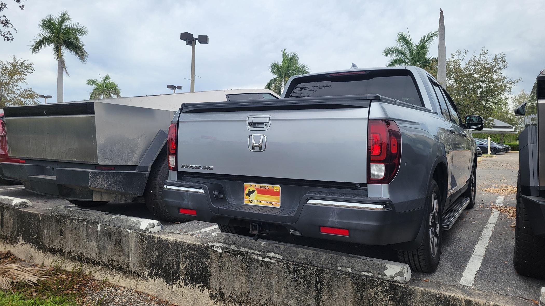 Tesla Cybertruck 3 Cybertrucks compared to my Ridgeline @ Fort Myers, FL - Service Center 20240302_142140