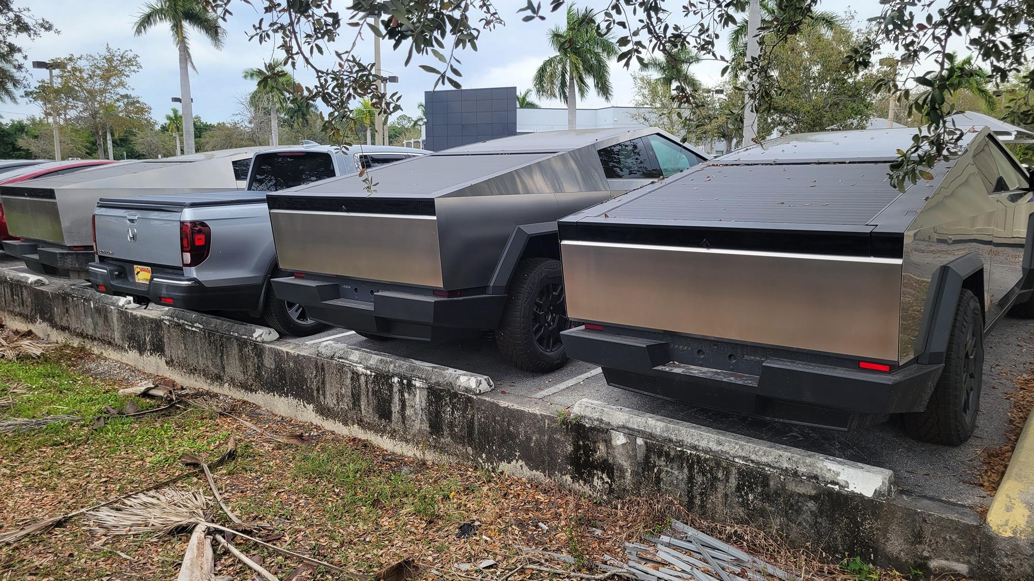 Tesla Cybertruck 3 Cybertrucks compared to my Ridgeline @ Fort Myers, FL - Service Center 20240302_142104