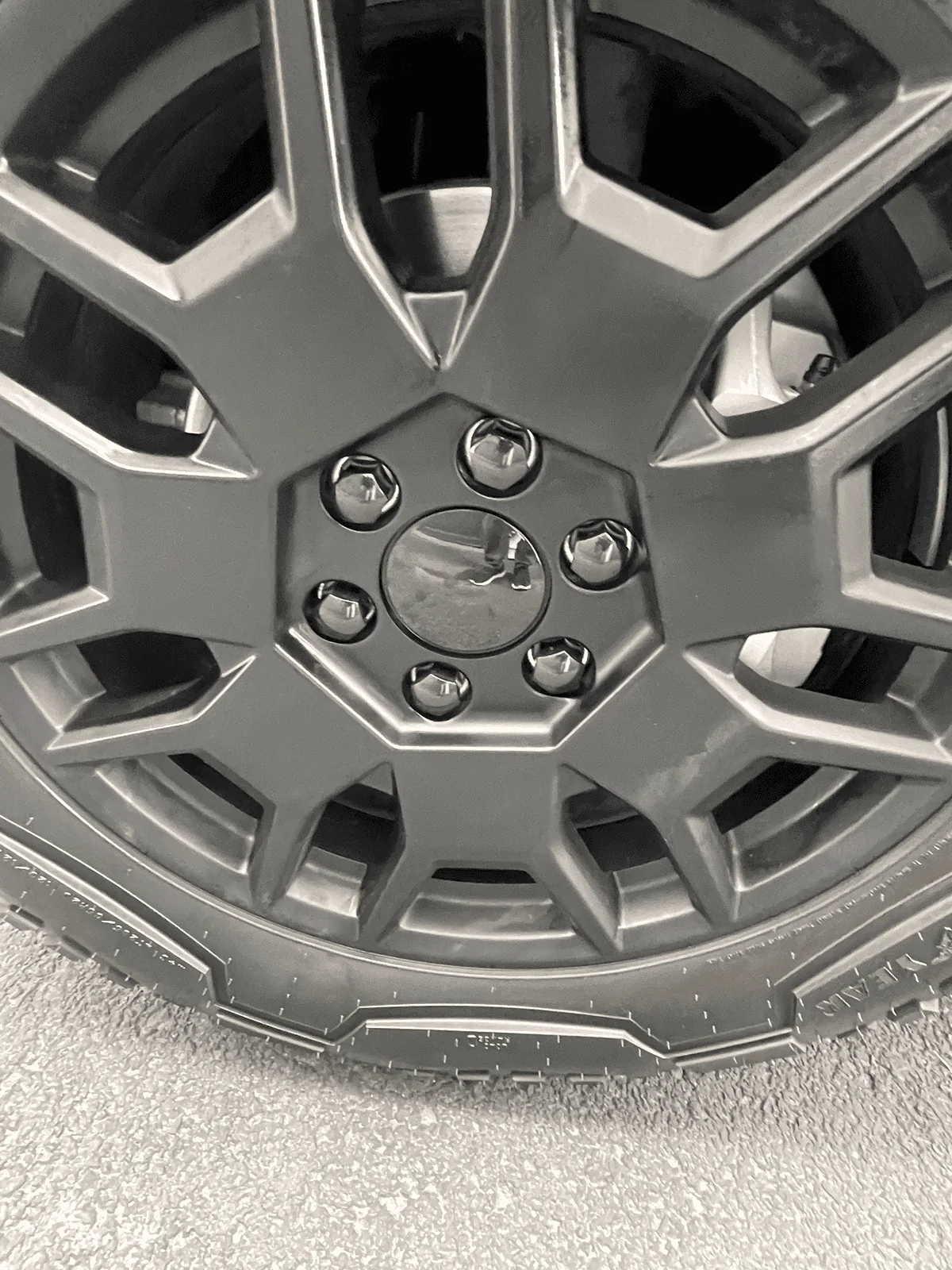 Tesla Cybertruck Accessories installed: Molle Vault Cargo Divider + Vault Cargo Bins (Dimensions Inside) + Wheel Center Caps 1710512911212-v4
