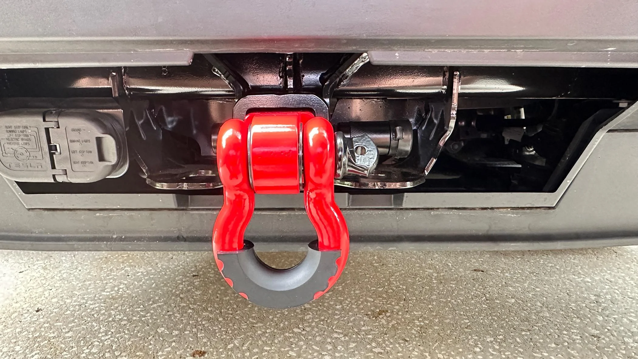 Tesla Cybertruck A Splash of Color! Tow hitch ring installed IMG_1506