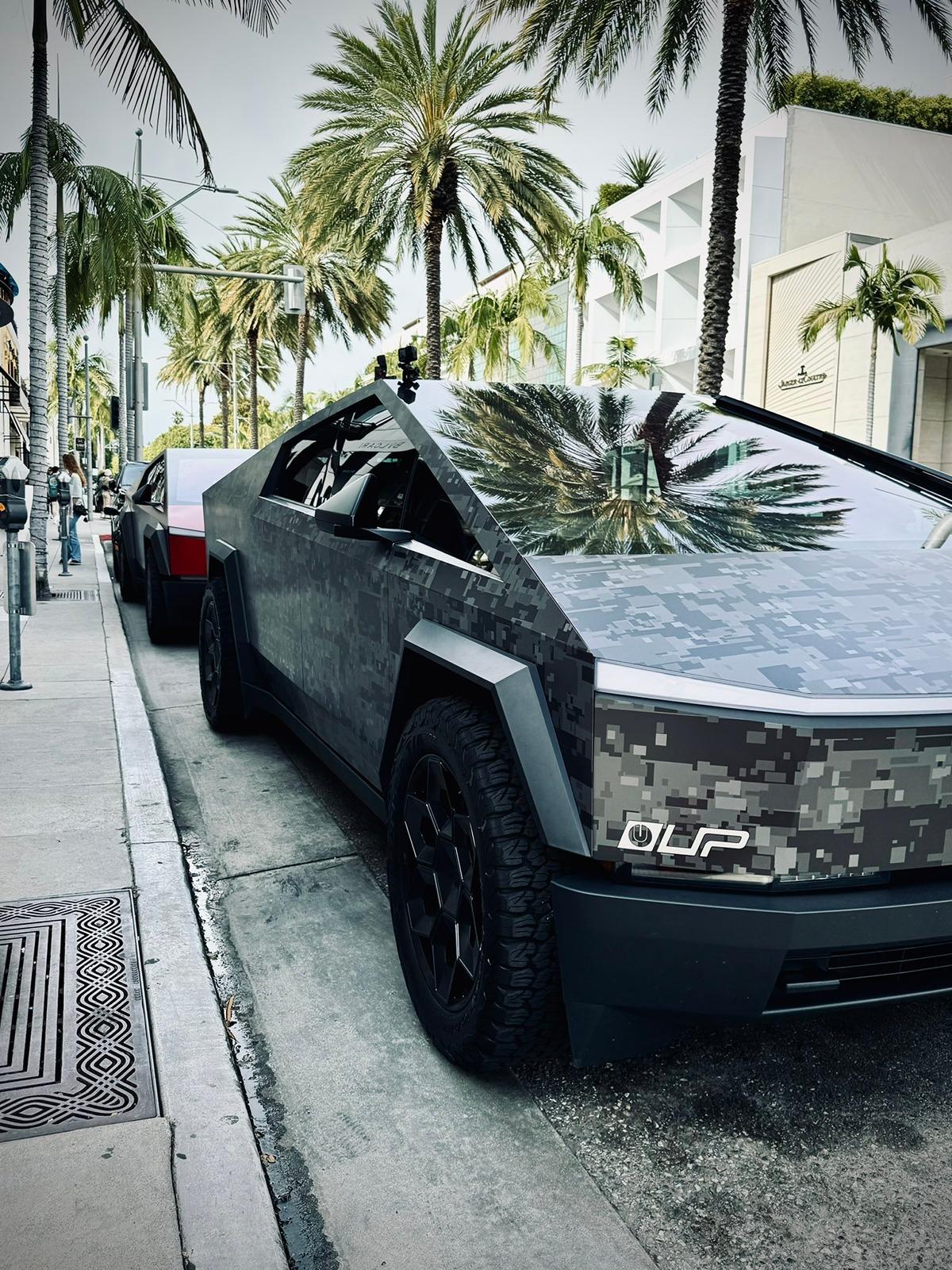 Tesla Cybertruck Unplugged Performance transforms Cybertruck w/ 22" Cybrhex wheels, 35" BFG KO2 tires, digi-camo wrap GIwIlDgaAAAjX51