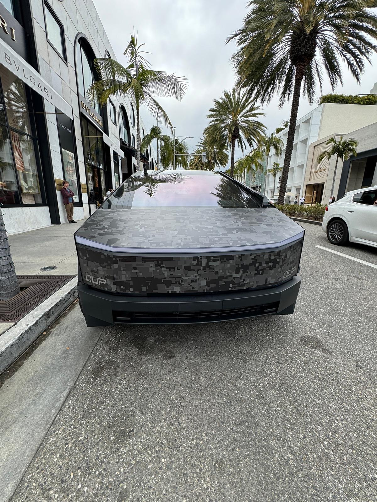 Tesla Cybertruck Unplugged Performance transforms Cybertruck w/ 22" Cybrhex wheels, 35" BFG KO2 tires, digi-camo wrap GIwLZIEbcAEmkFC