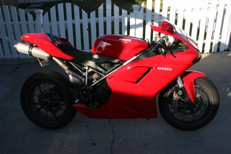 Tesla Cybertruck First liquid PPF "painted" Cybertruck in Rosso Ferrari Red ducati 006