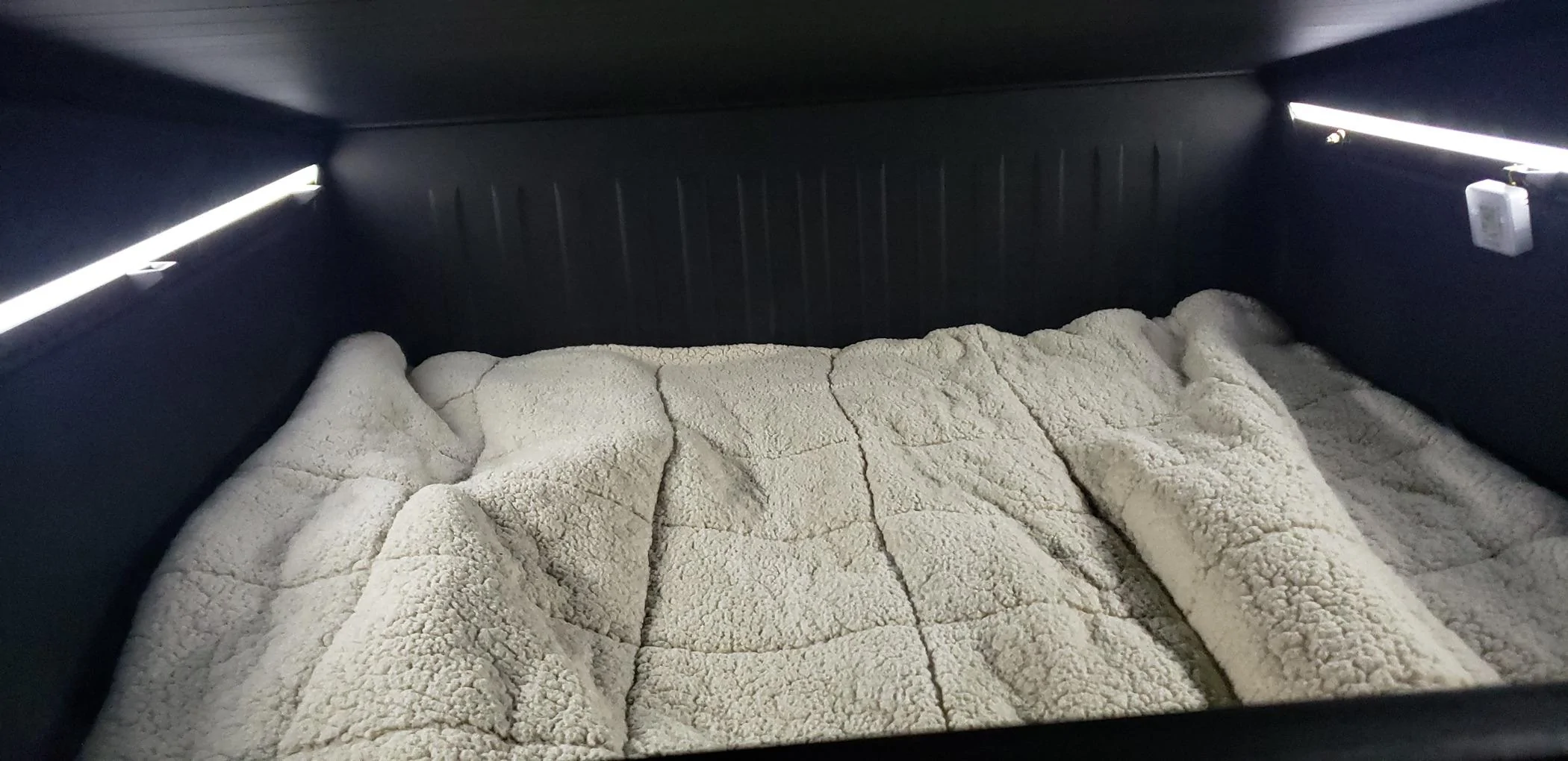 Tesla Cybertruck Cybertruck bed mattress solution - EXPED 72"x25.6"x3" air mattresses + BougeRV 2900 BTU heat pump Vault Bed 2