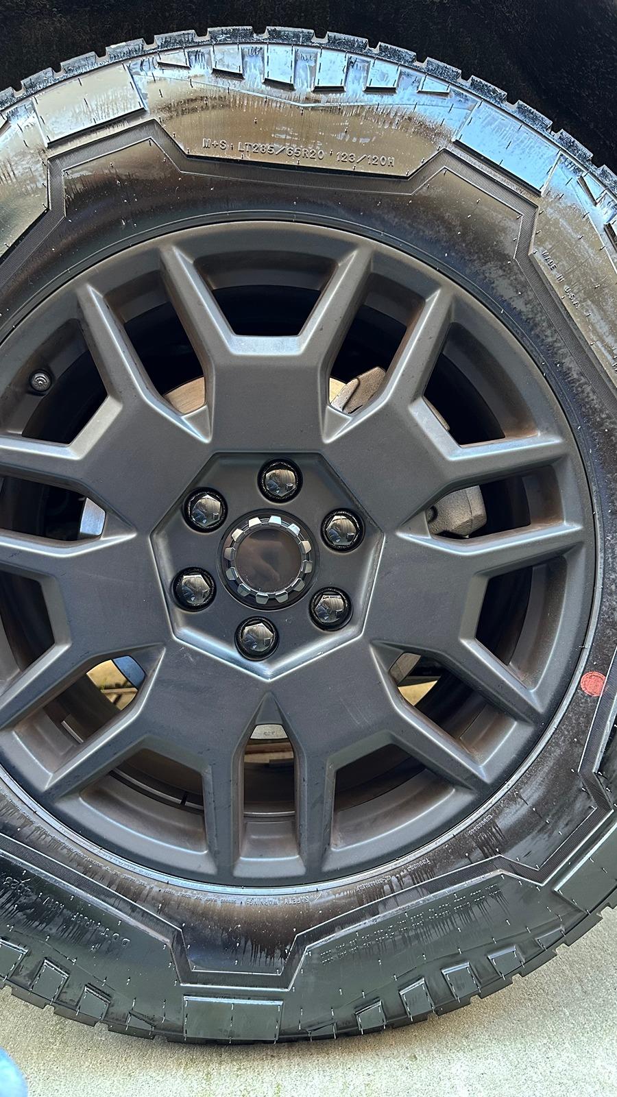 Tesla Cybertruck Rust in center of wheel hub? IMG_5331
