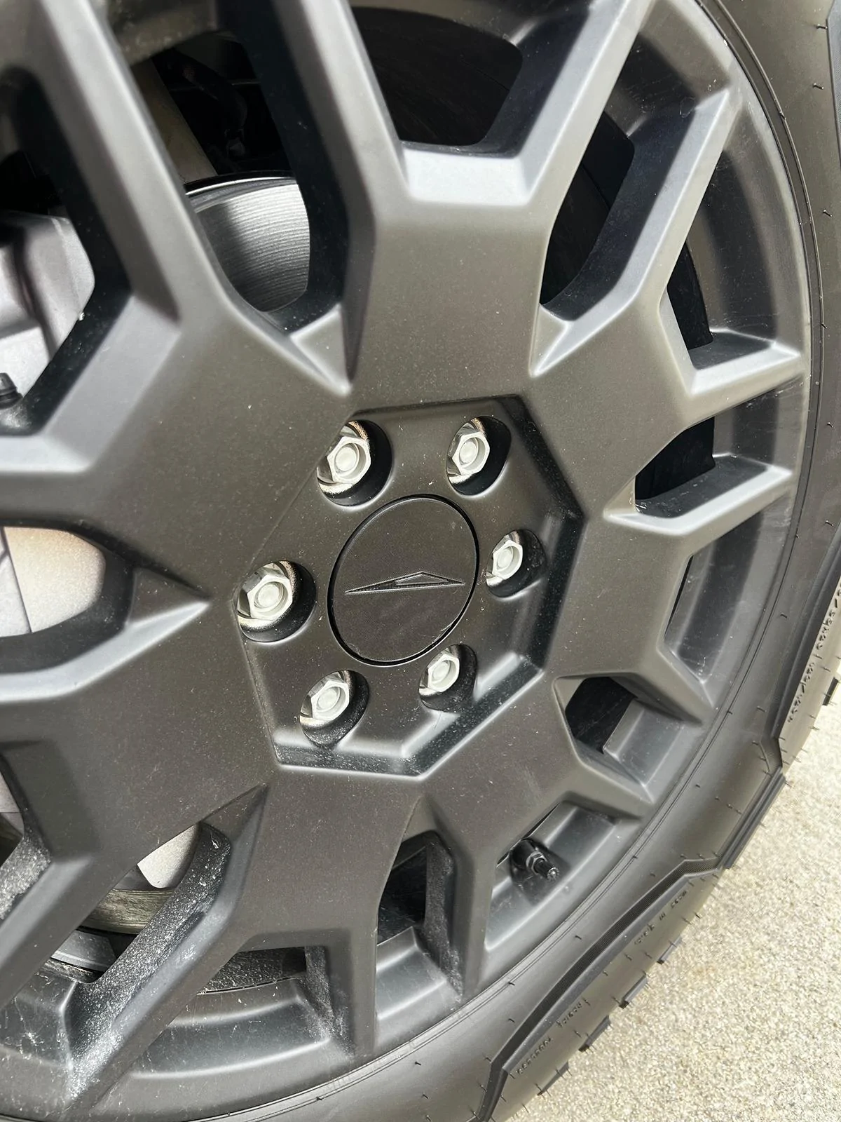 Tesla Cybertruck Rust in center of wheel hub? IMG_4251