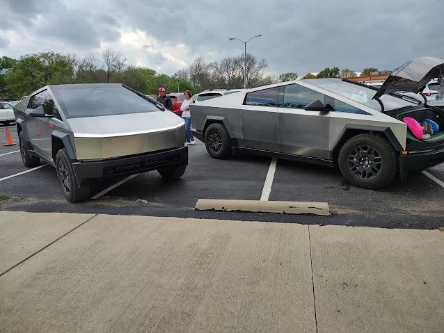 Tesla Cybertruck Two Cybertrucks at Eggstravaganza j5_Zo_1F_siyyEwkGxBD8=w638-h479-s-no-gm?authuser=0