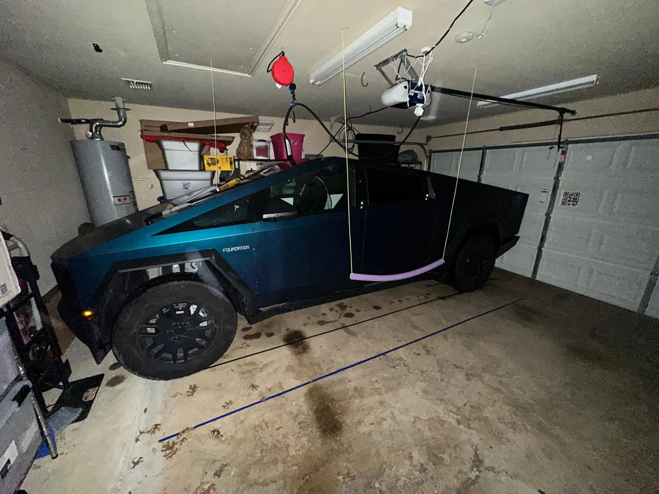 Tesla Cybertruck Cybertruck doesn't quite fit in my standard garage. Yours? IMG_4844