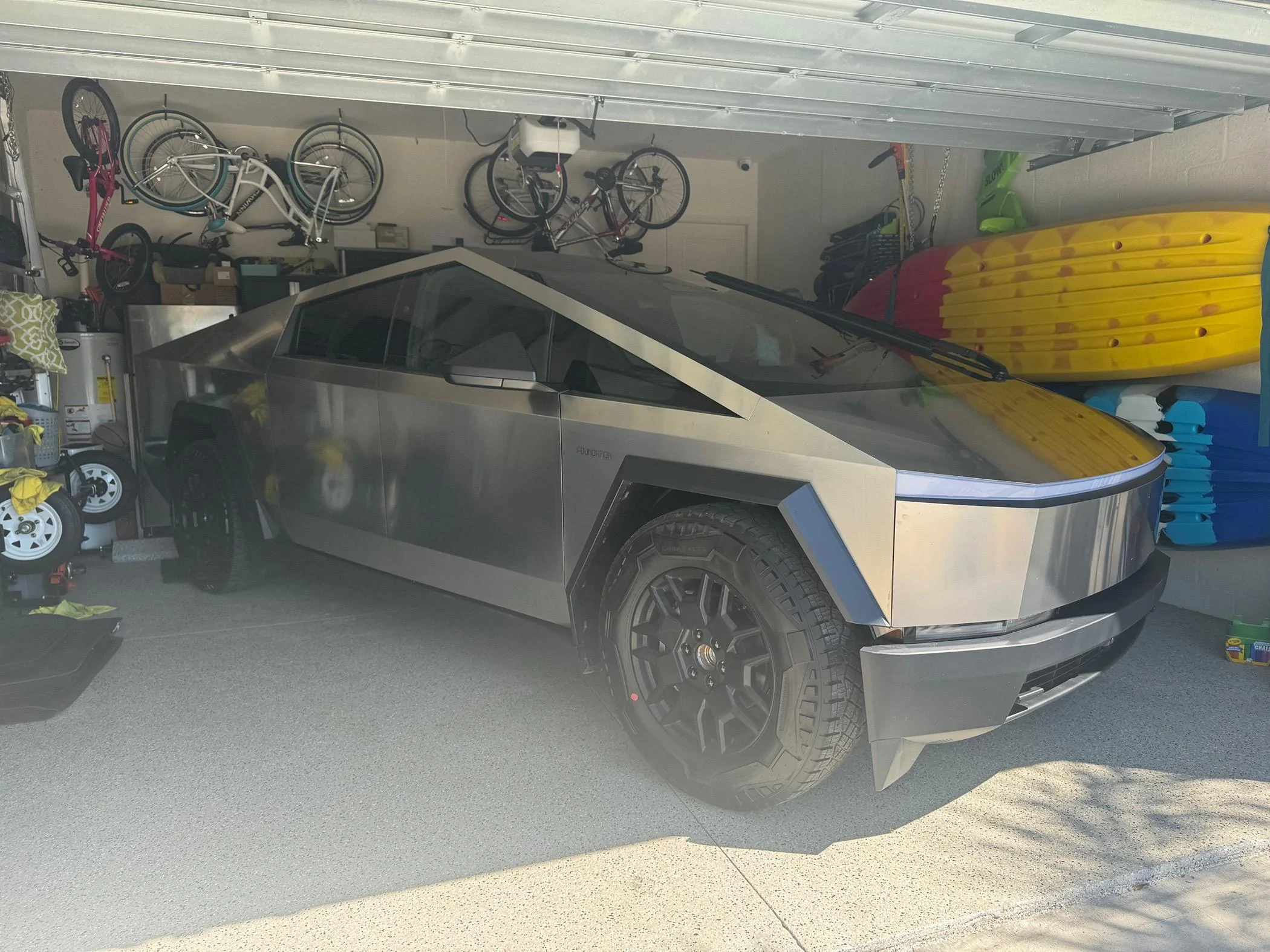 Tesla Cybertruck Cybertruck doesn't quite fit in my standard garage. Yours? IMG_2243