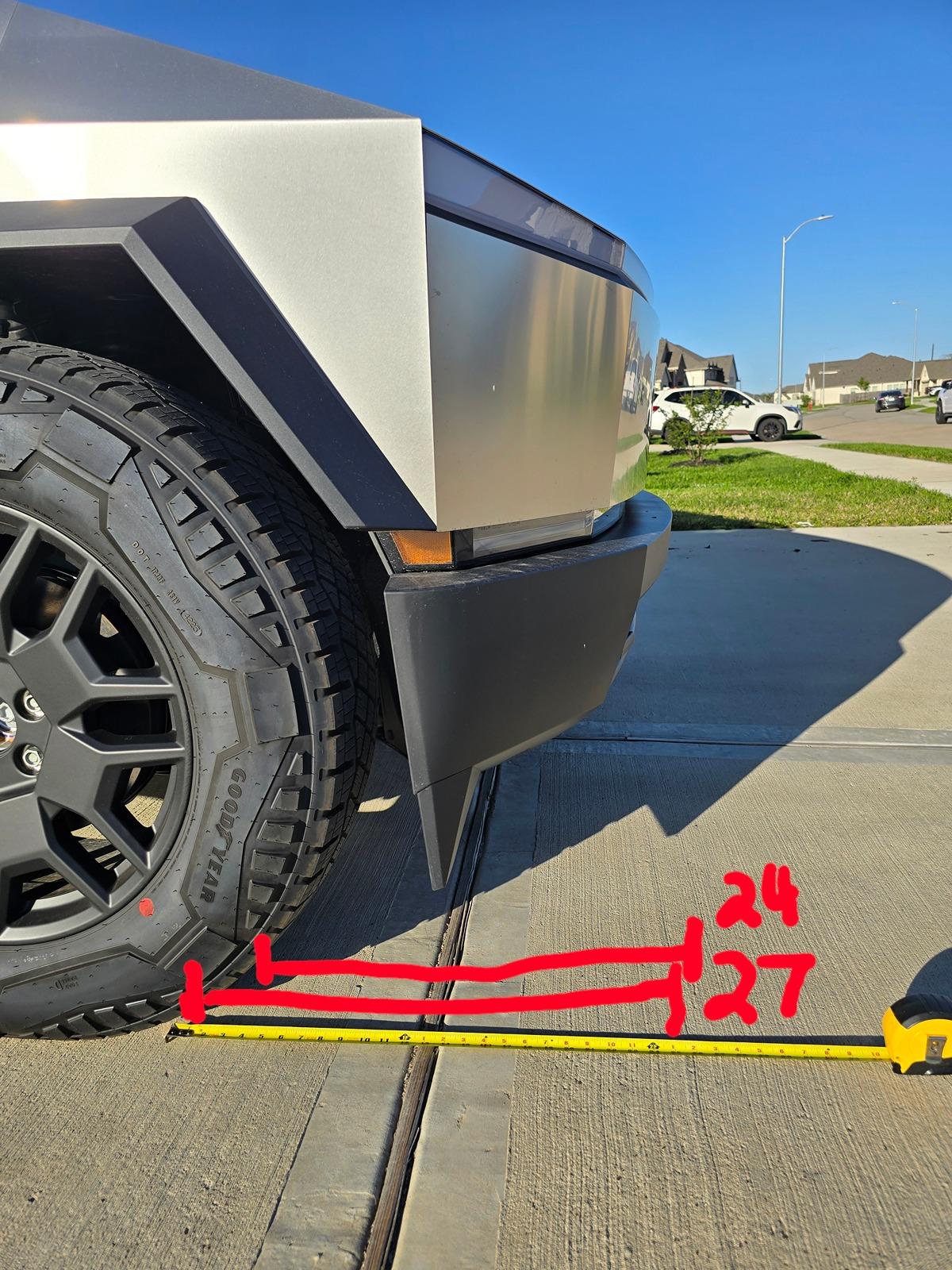 Tesla Cybertruck Cybertruck doesn't quite fit in my standard garage. Yours? 1000006388