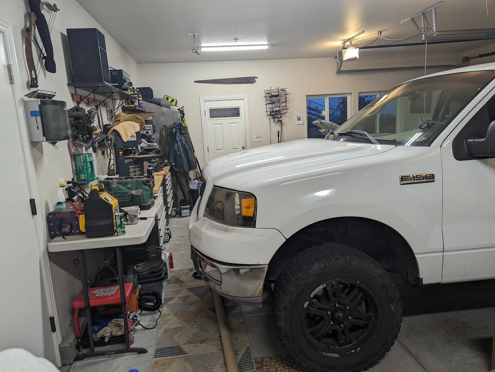 Tesla Cybertruck Cybertruck doesn't quite fit in my standard garage. Yours? PXL_20240218_015653580