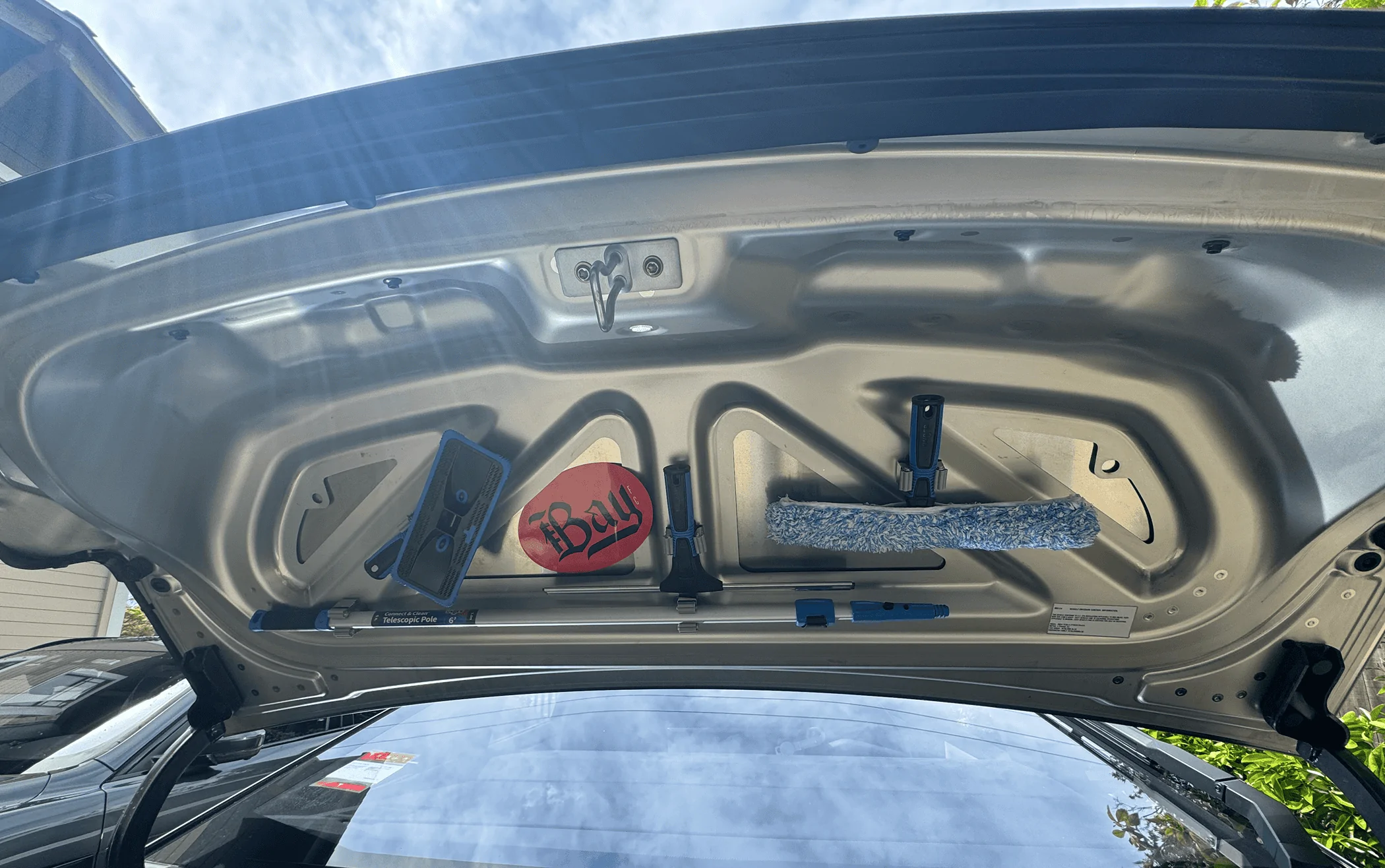 Tesla Cybertruck Cleaning inside of windshield -- using window cleaning mop with long handle Screenshot 2024-03-30 at 4.29.15 PM