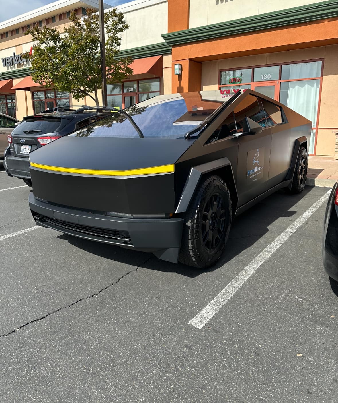 Tesla Cybertruck Yellow front lightbar on satin black Cybertruck 435286377_435492702311061_6073501462079973837_n