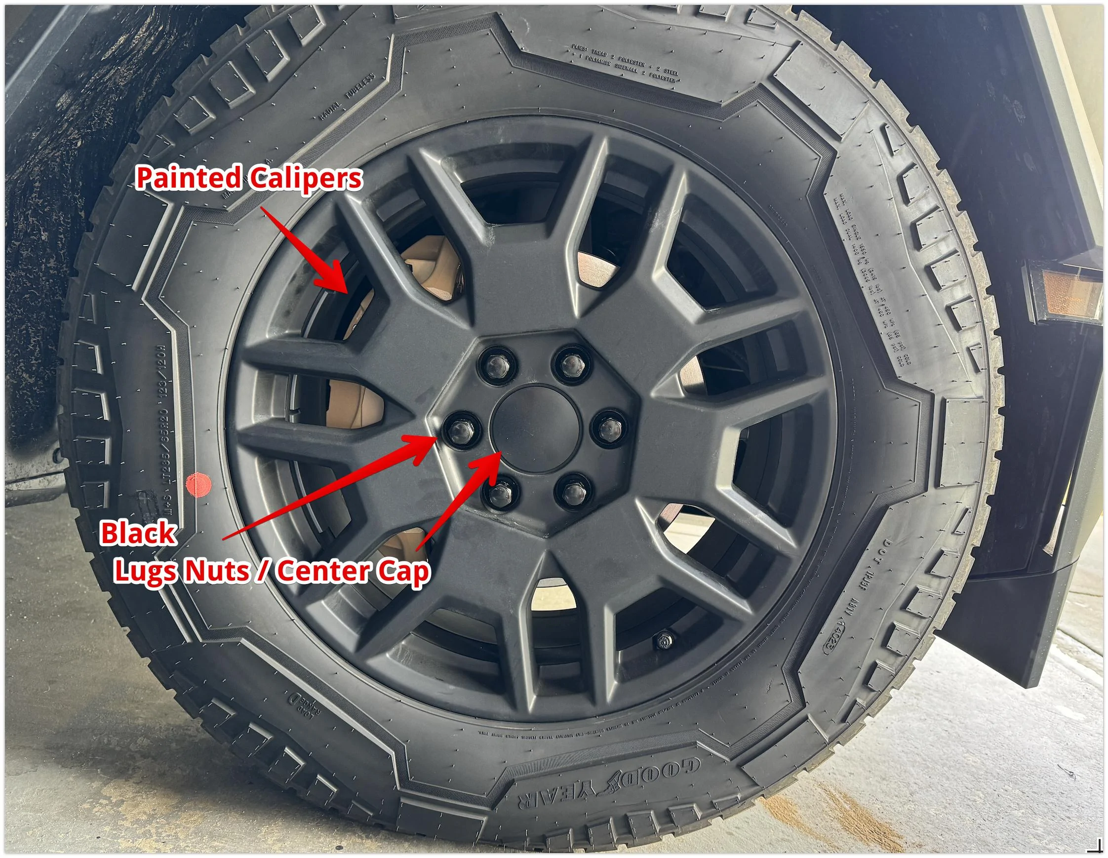 Tesla Cybertruck Stainless Steel Inlet, Calipers Painted, Blk lugs & Center Cap, Fluid washer cap gasket issue. Front Painted