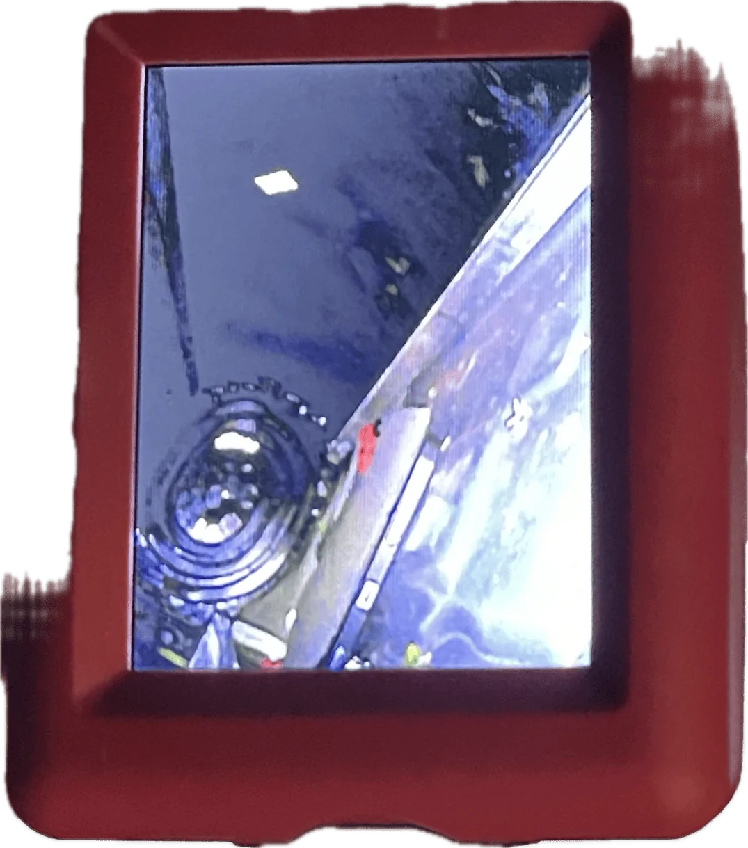 Tesla Cybertruck Kid dropped iPad down tonneau cover slit. 1713725551171-xy