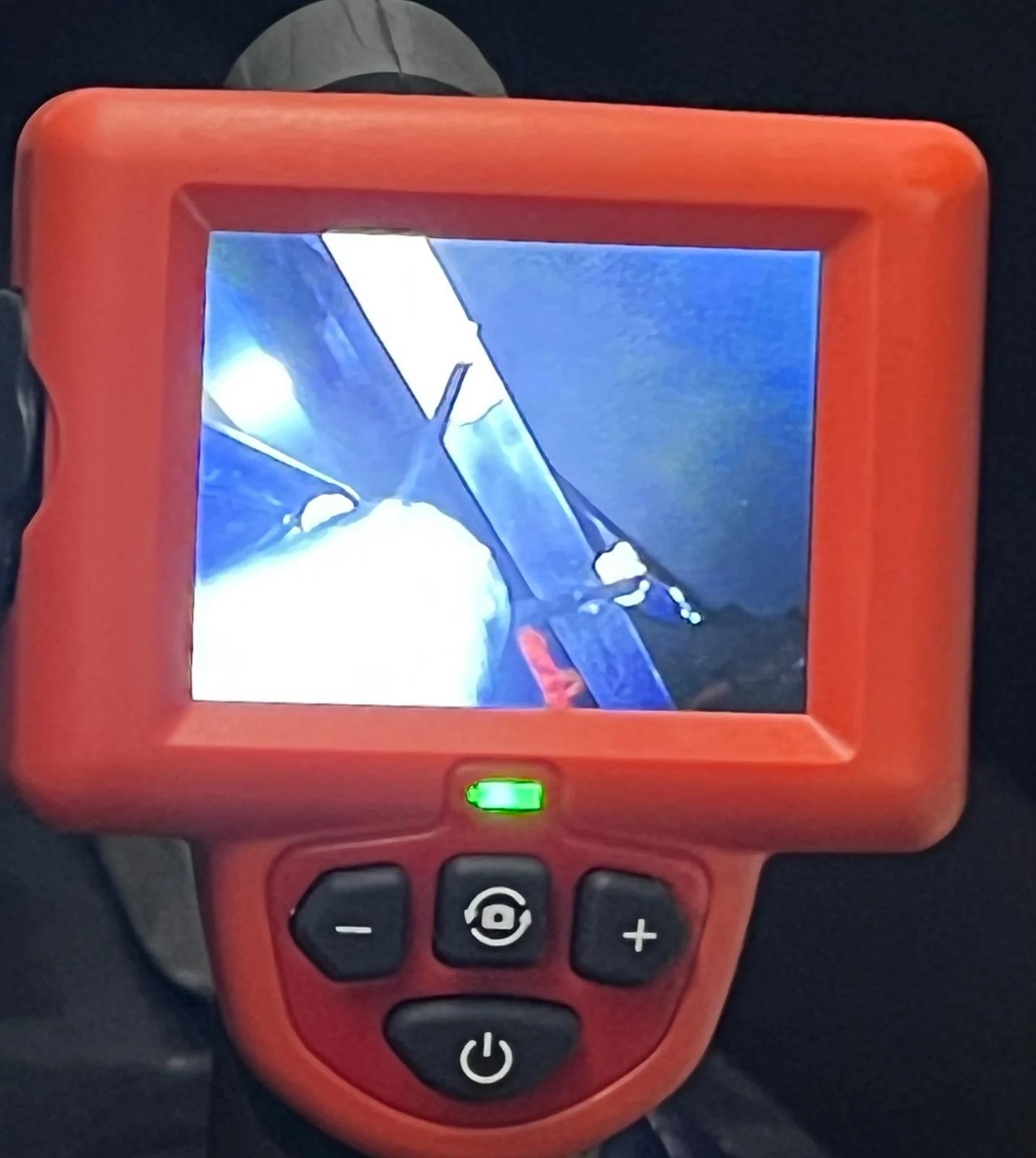 Tesla Cybertruck Kid dropped iPad down tonneau cover slit. 1713797160055-ev
