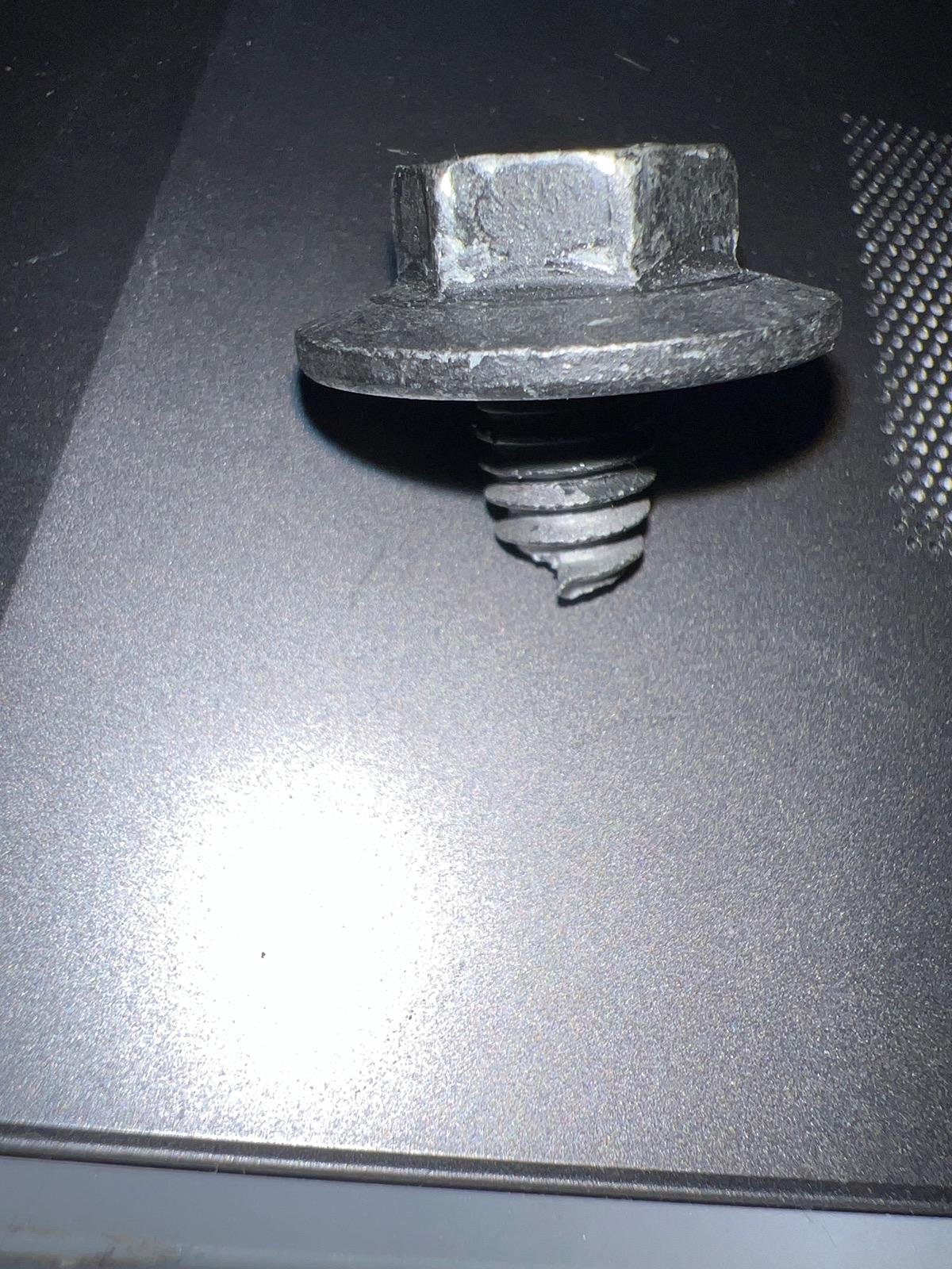 Tesla Cybertruck Kid dropped iPad down tonneau cover slit. image