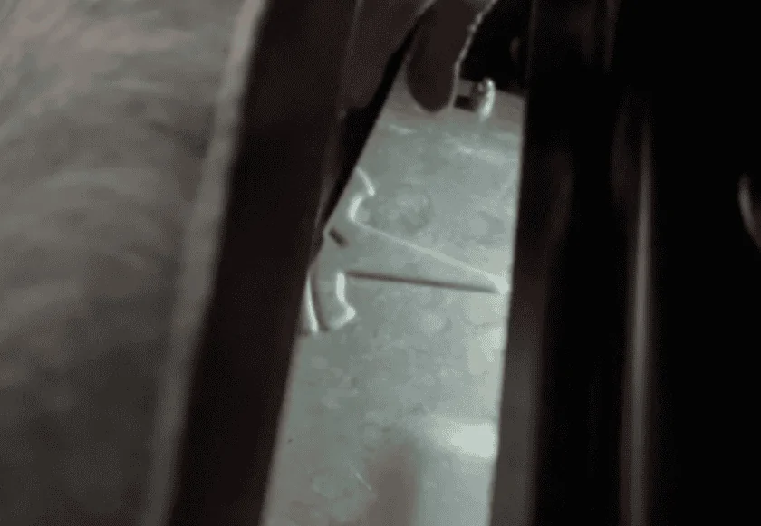Tesla Cybertruck Kid dropped iPad down tonneau cover slit. 1713807341760-sa