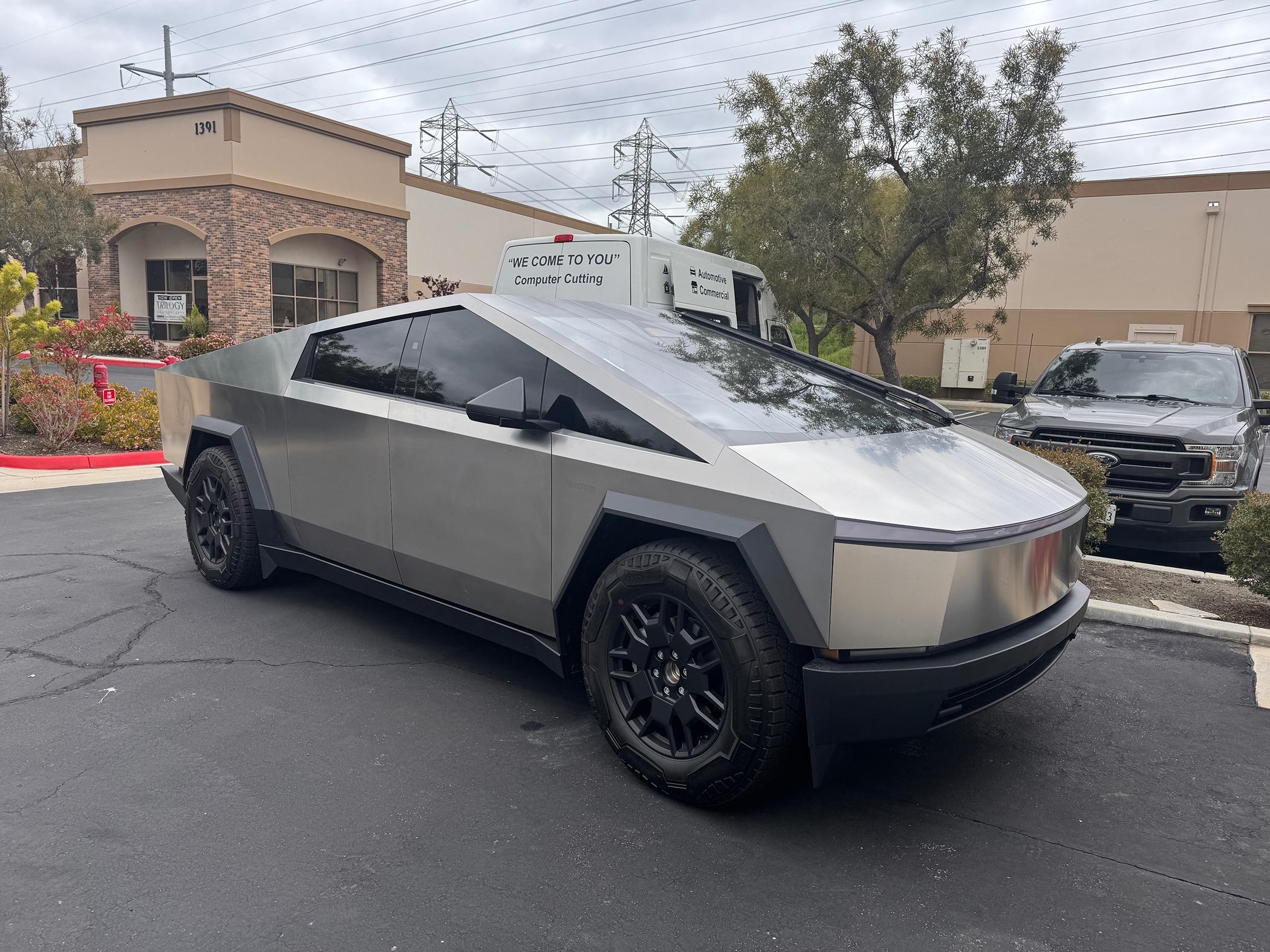 Tesla Cybertruck Cybertruck vs. Ferrari response from public IMG_3743
