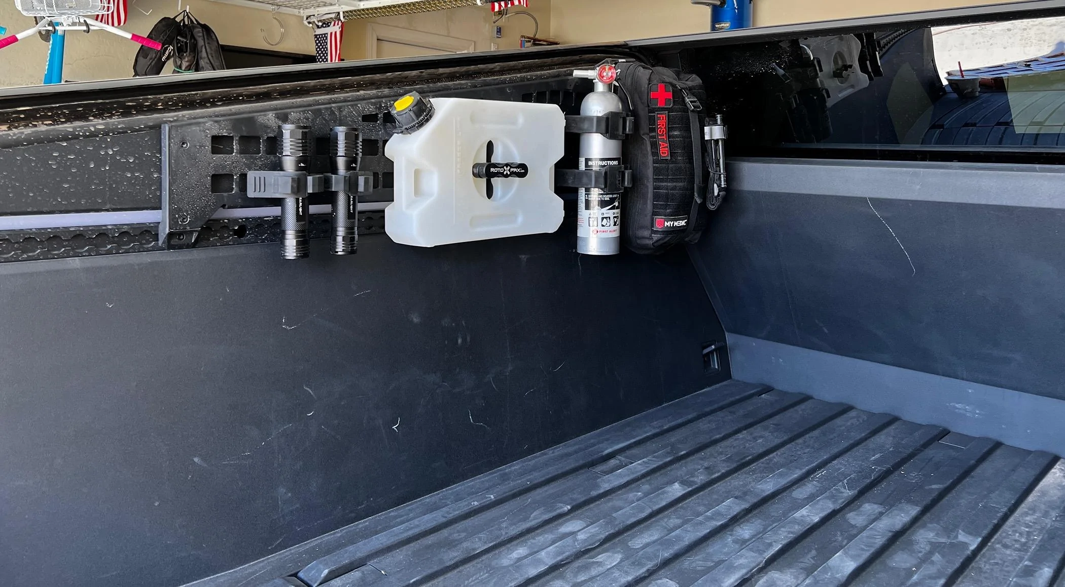 Tesla Cybertruck MOLLE panels - what gear have you mounted? IMG_7973