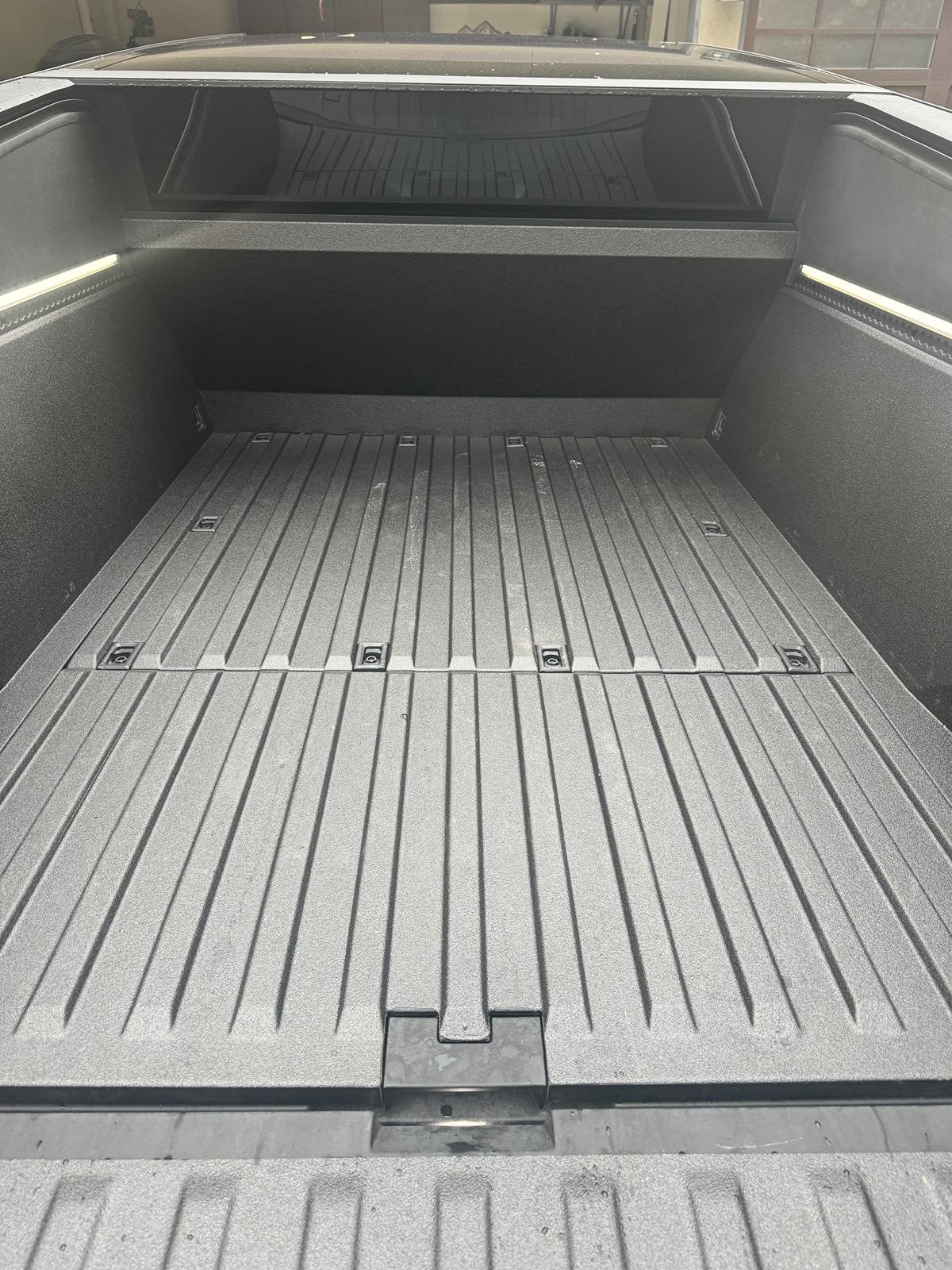 Tesla Cybertruck Rhino Lining spray in bed liner applied to my Cybertruck bed IMG_1435