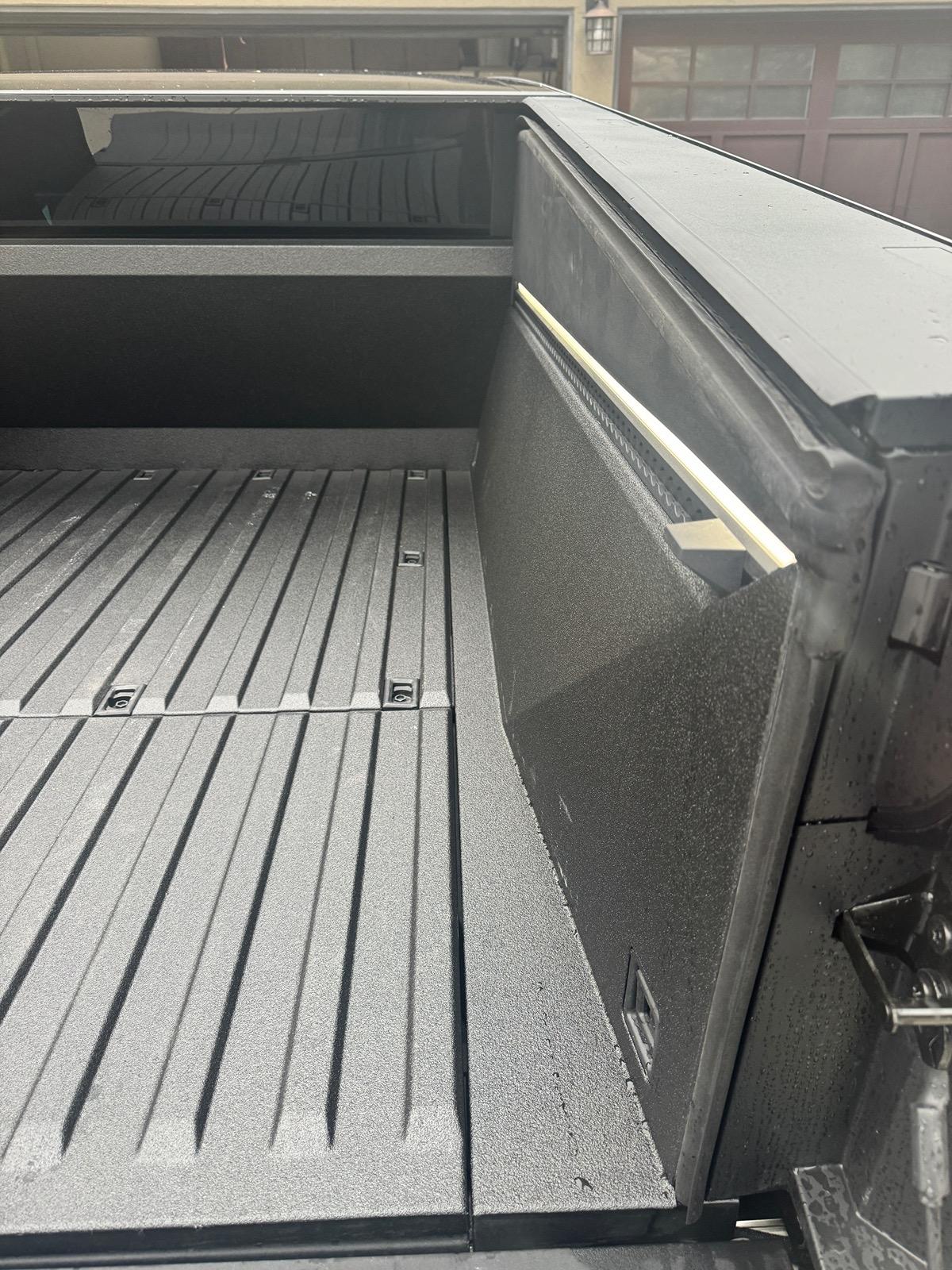 Tesla Cybertruck Rhino Lining spray in bed liner applied to my Cybertruck bed IMG_1436