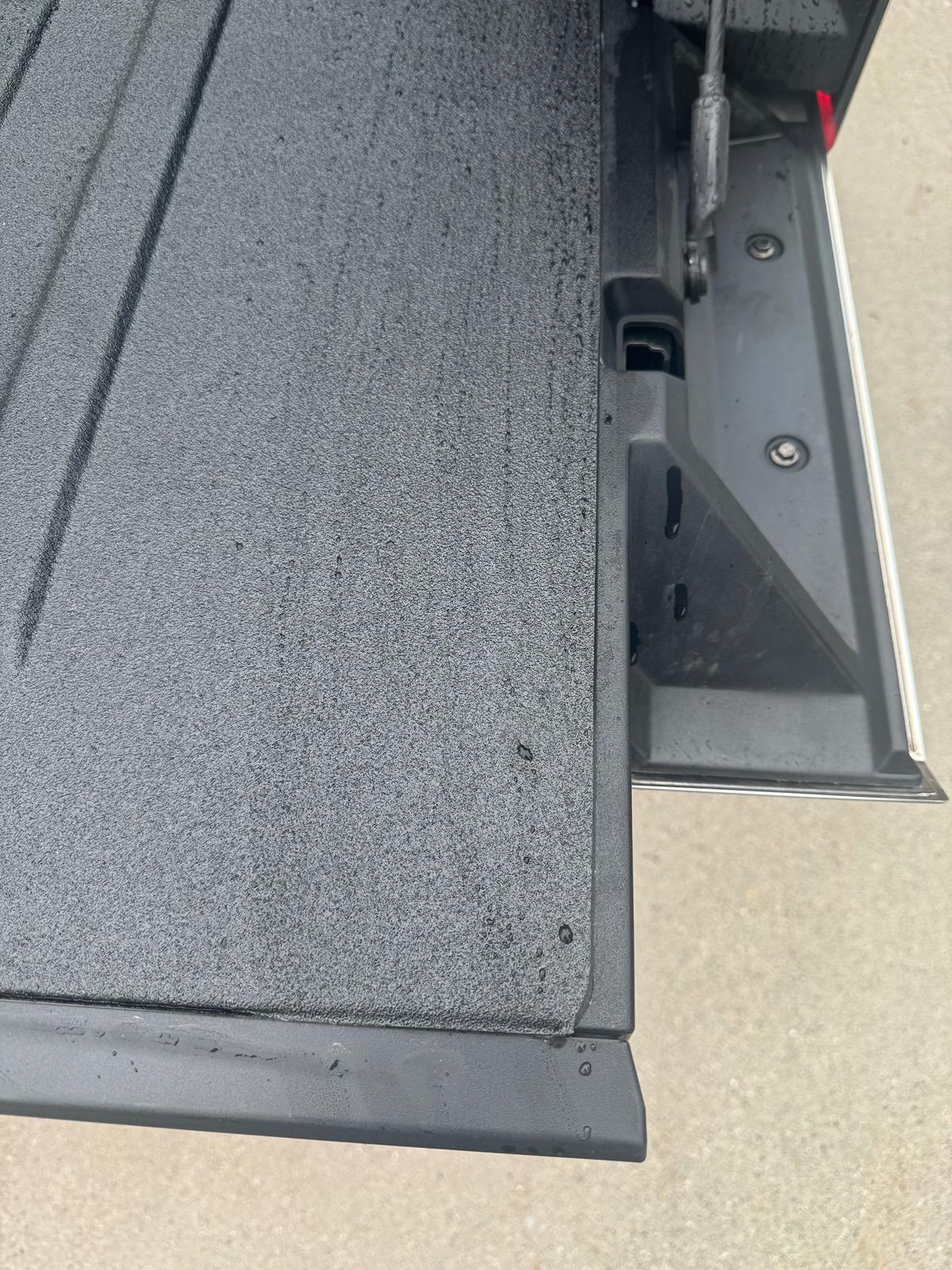 Tesla Cybertruck Rhino Lining spray in bed liner applied to my Cybertruck bed IMG_1437