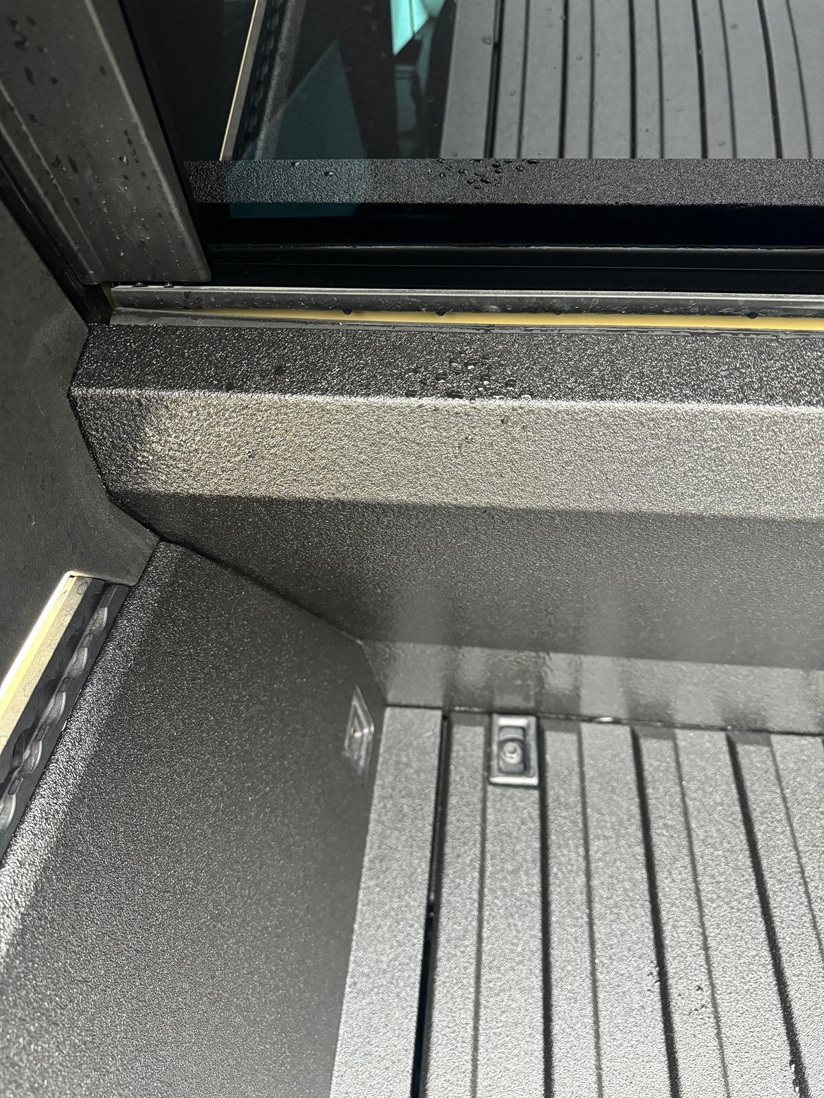 Tesla Cybertruck Rhino Lining spray in bed liner applied to my Cybertruck bed IMG_1438