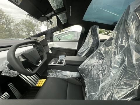 Tesla Cybertruck A cool dozen Cybertrucks in a holding lot for Lawrenceville NJ 8F477876-81D9-4360-B03B-CF5F914E67B8_4_5005_c