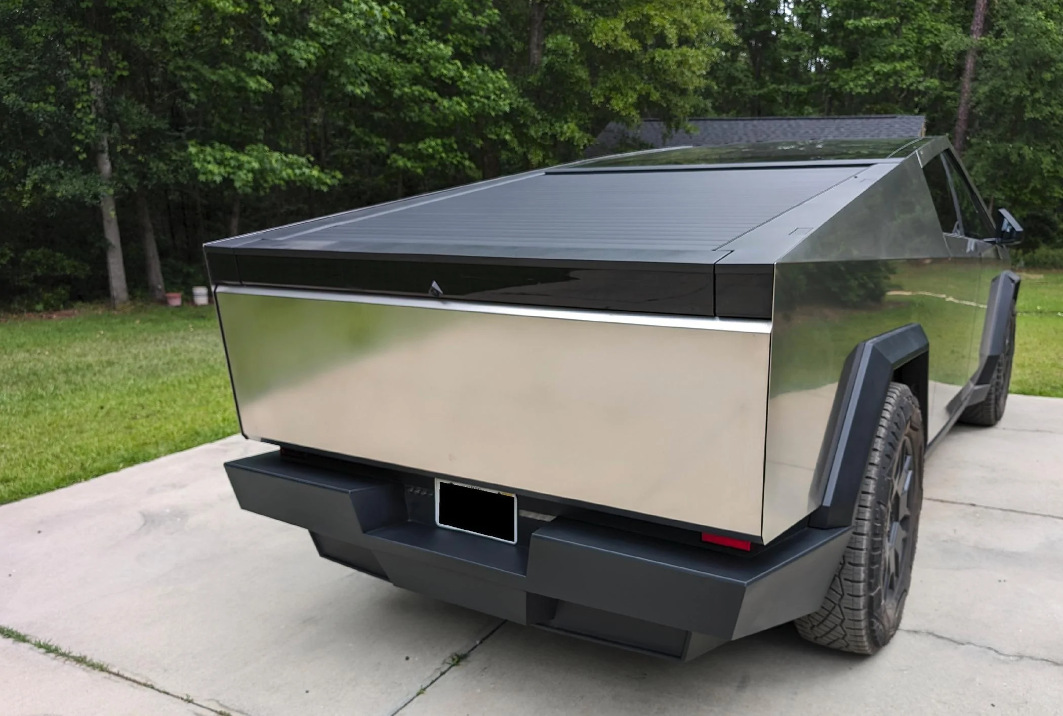 Tesla Cybertruck PSA: Be Careful With Air Suspension Automatic Lowering! Have clearance under truck & bumpers - to prevent damage like this PXL_20240427_162326198