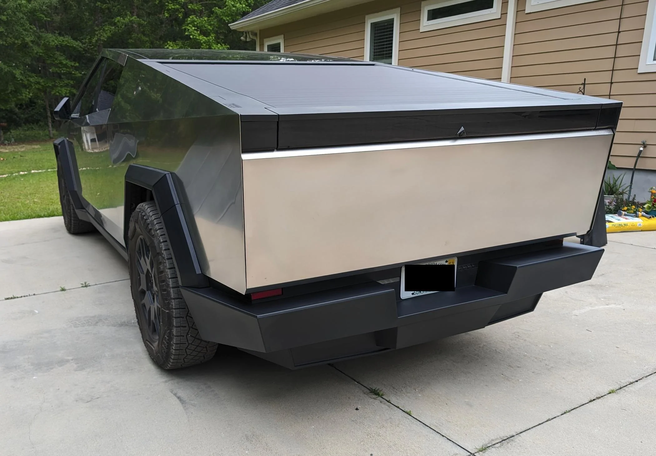 Tesla Cybertruck PSA: Be Careful With Air Suspension Automatic Lowering! Have clearance under truck & bumpers - to prevent damage like this PXL_20240427_162338114