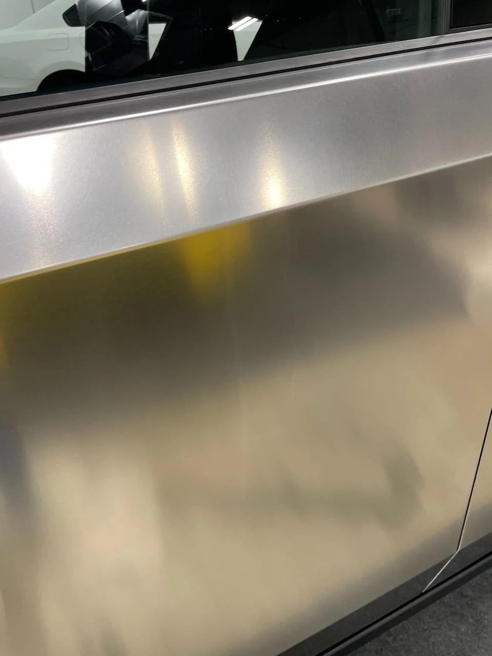 Tesla Cybertruck what are these stains?  tried rust remover and have the ProTectaClear 73620063589__EEE8C865-CE3B-4298-AFF7-D36E02E85C82