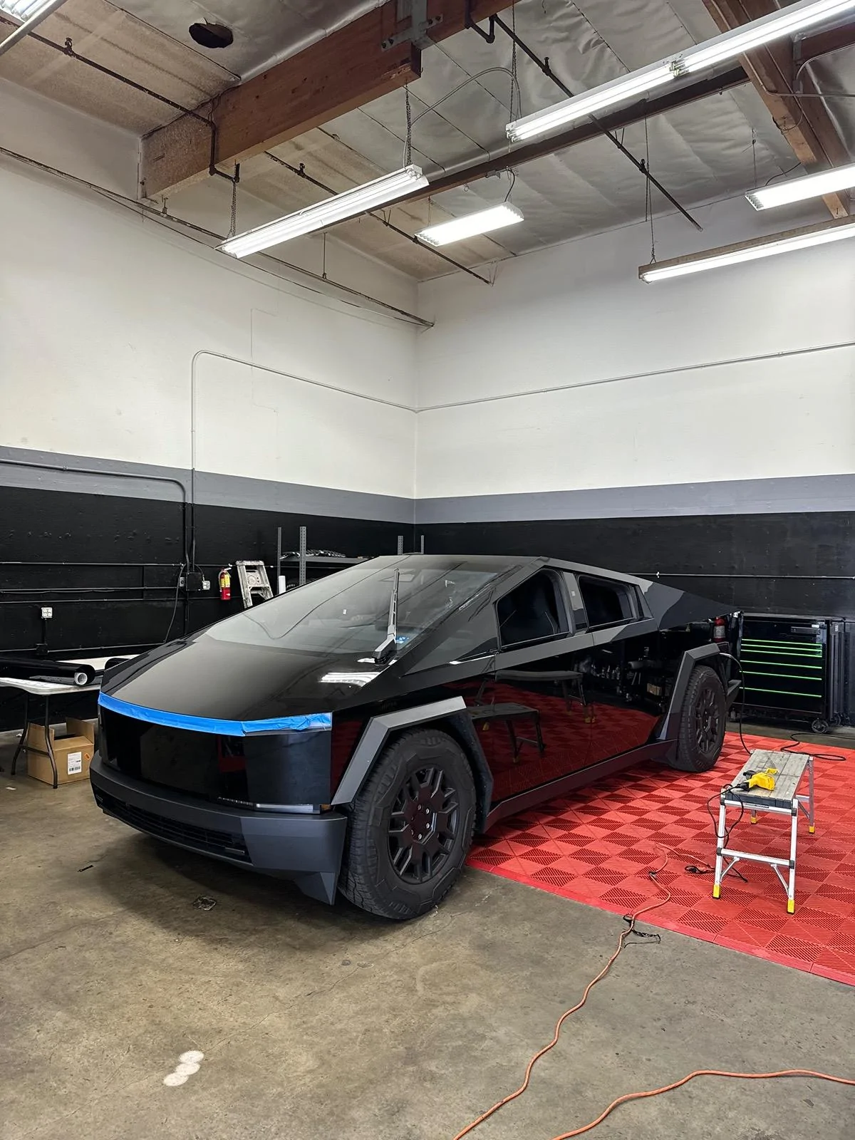 Tesla Cybertruck Got my refective Tron wrap done! -- Cybertruck w/ Inozetek gloss black vinyl wrap + 3M reflective tape + Xpel clear PPF on hood 73611535946__960F46EB-A3B7-4D67-B7B5-49AC0516D3A3