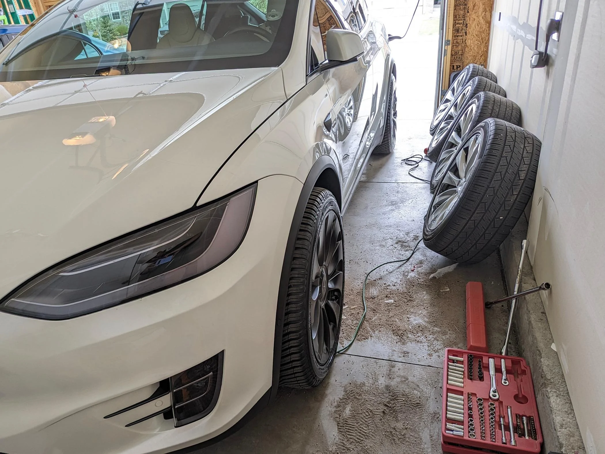 Tesla Cybertruck Got my refective Tron wrap done! -- Cybertruck w/ Inozetek gloss black vinyl wrap + 3M reflective tape + Xpel clear PPF on hood PXL_20240426_194016674