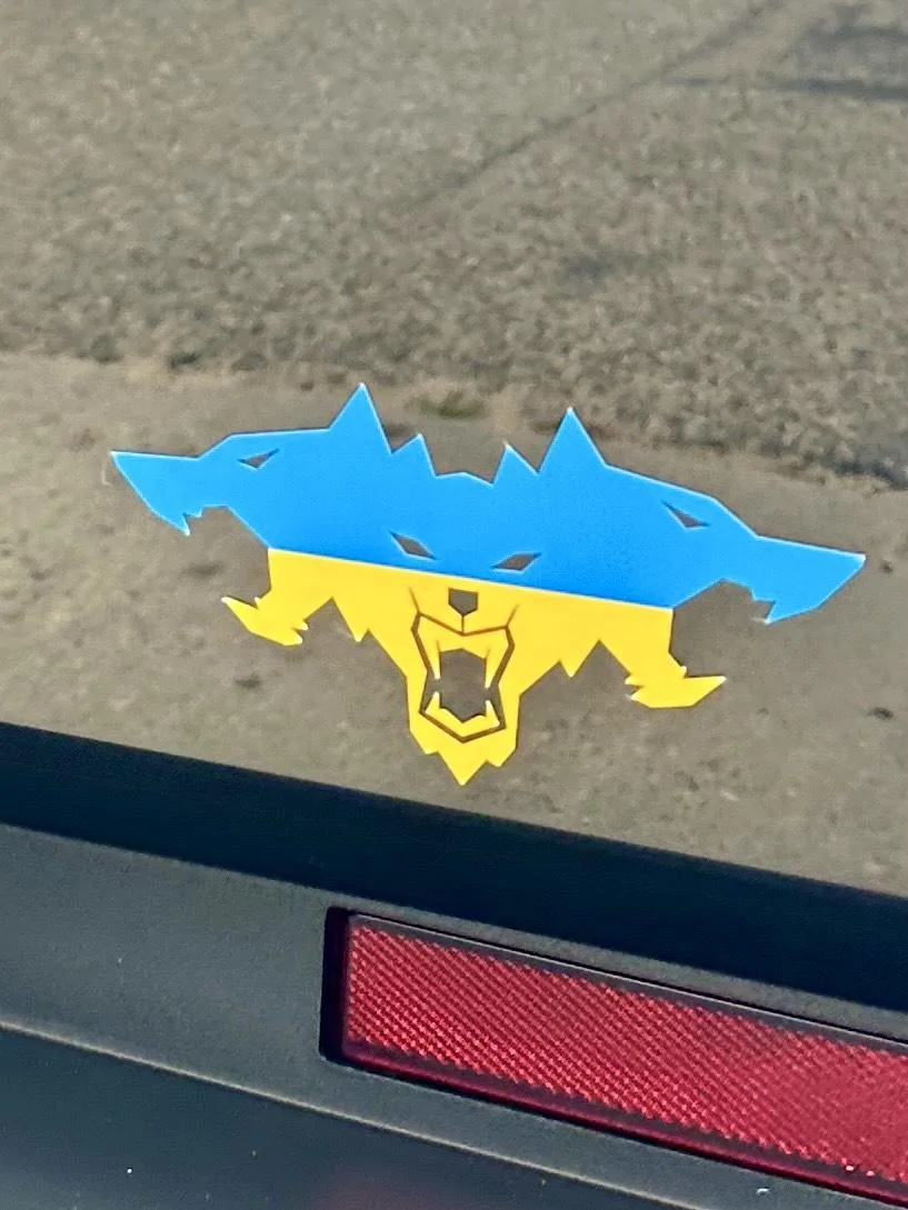 Tesla Cybertruck Cyberbeast with XPEL PPF Gloss Slack + tint + custom color Cerberus (Ukrainian Flag) and yellow Foundation Series logos IMG_3430