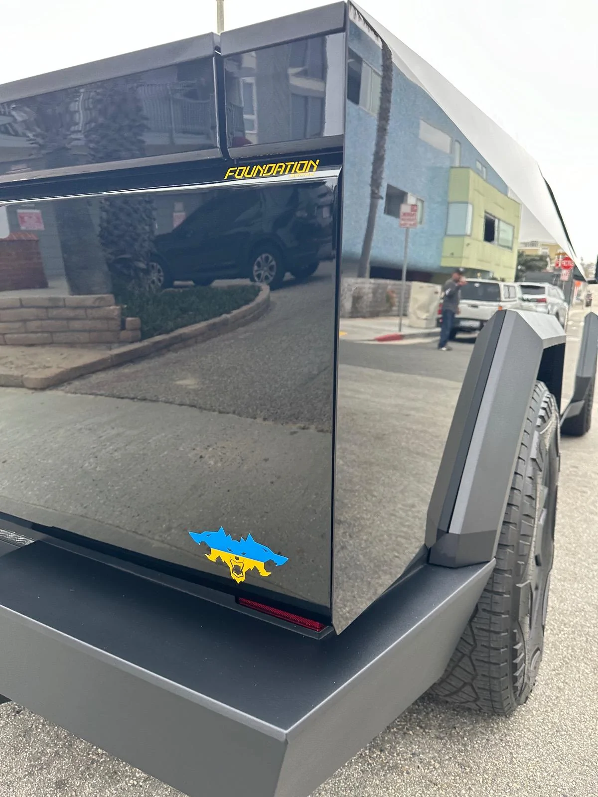 Tesla Cybertruck Cyberbeast with XPEL PPF Gloss Slack + tint + custom color Cerberus (Ukrainian Flag) and yellow Foundation Series logos IMG_3428