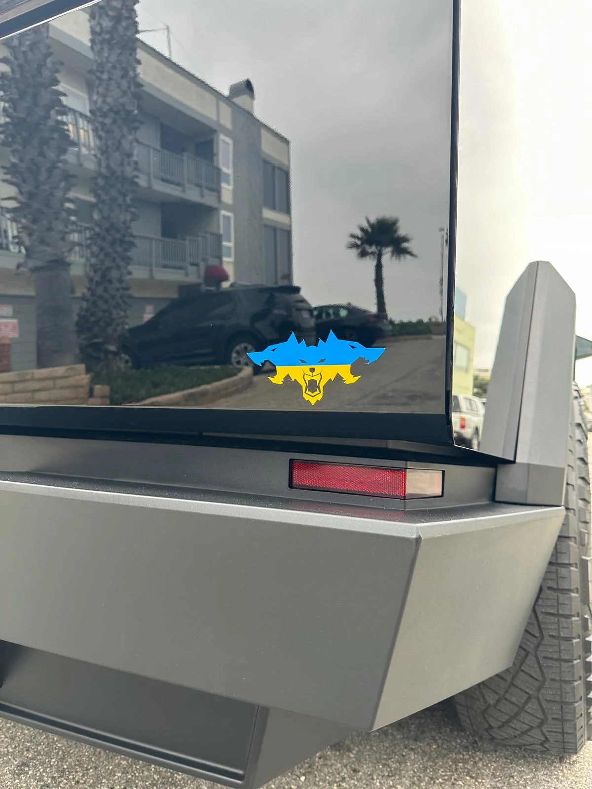 Tesla Cybertruck Cyberbeast with XPEL PPF Gloss Slack + tint + custom color Cerberus (Ukrainian Flag) and yellow Foundation Series logos IMG_3431