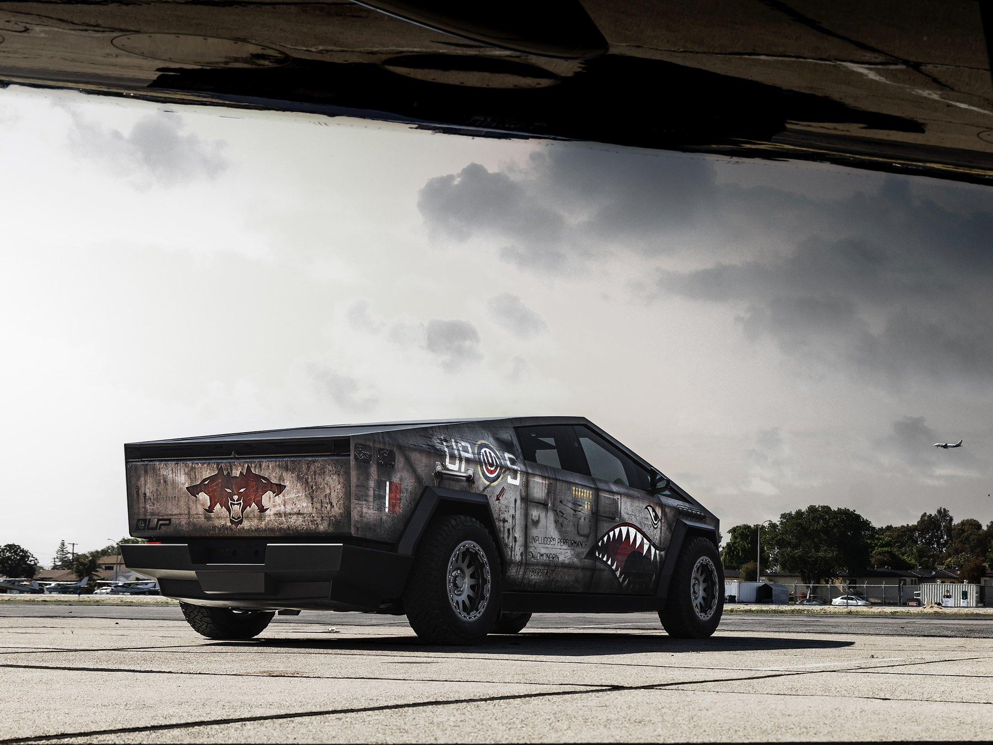 Tesla Cybertruck Shark Mouth P-51 Mustang Bomber custom wrap & modified Cybertruck (CyberBeast) by Unplugged Performance 🫡 GMrRHABasAAqeJm